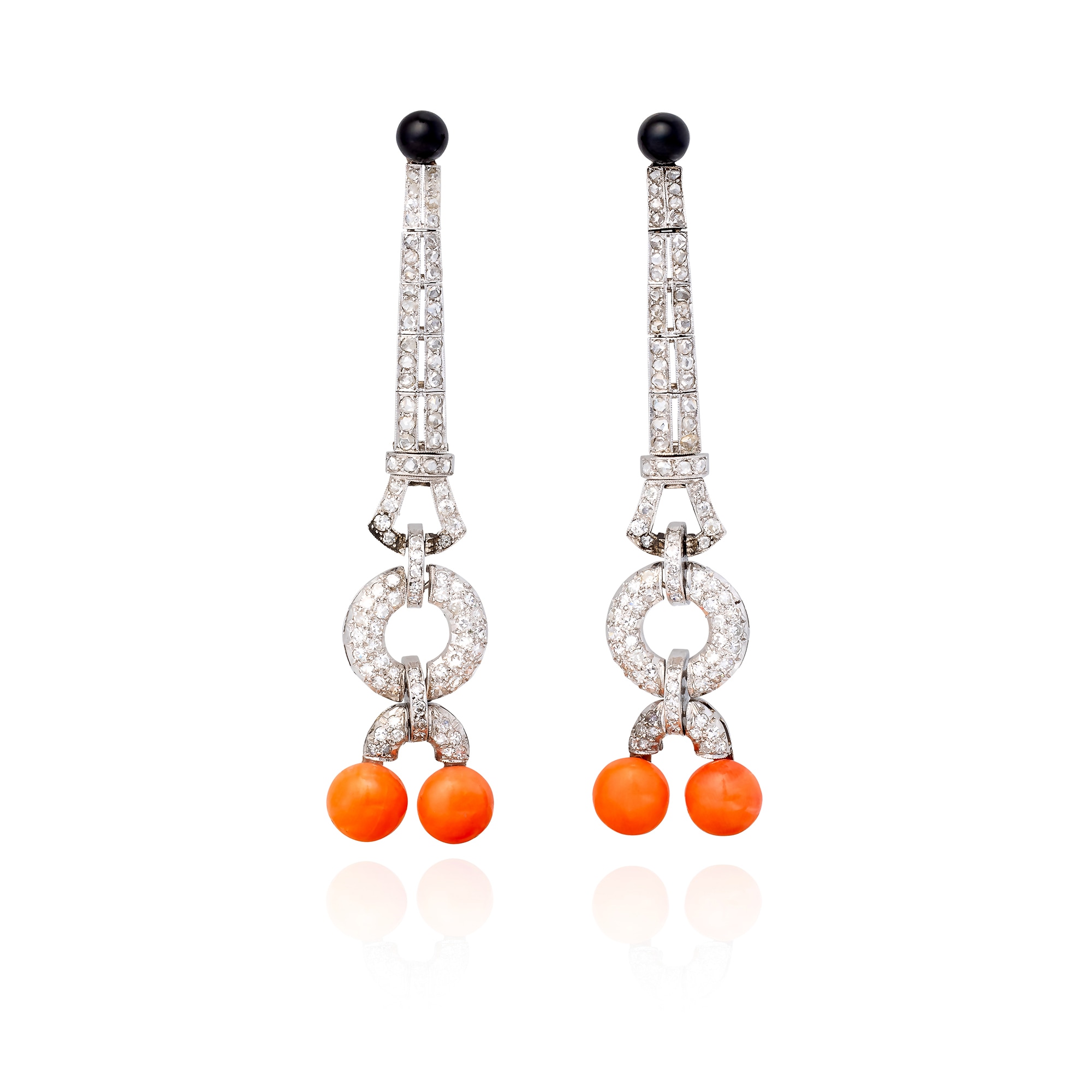 <p><em>Pair of diamond, coral and onyx earrings,</em> 1920s</p>
