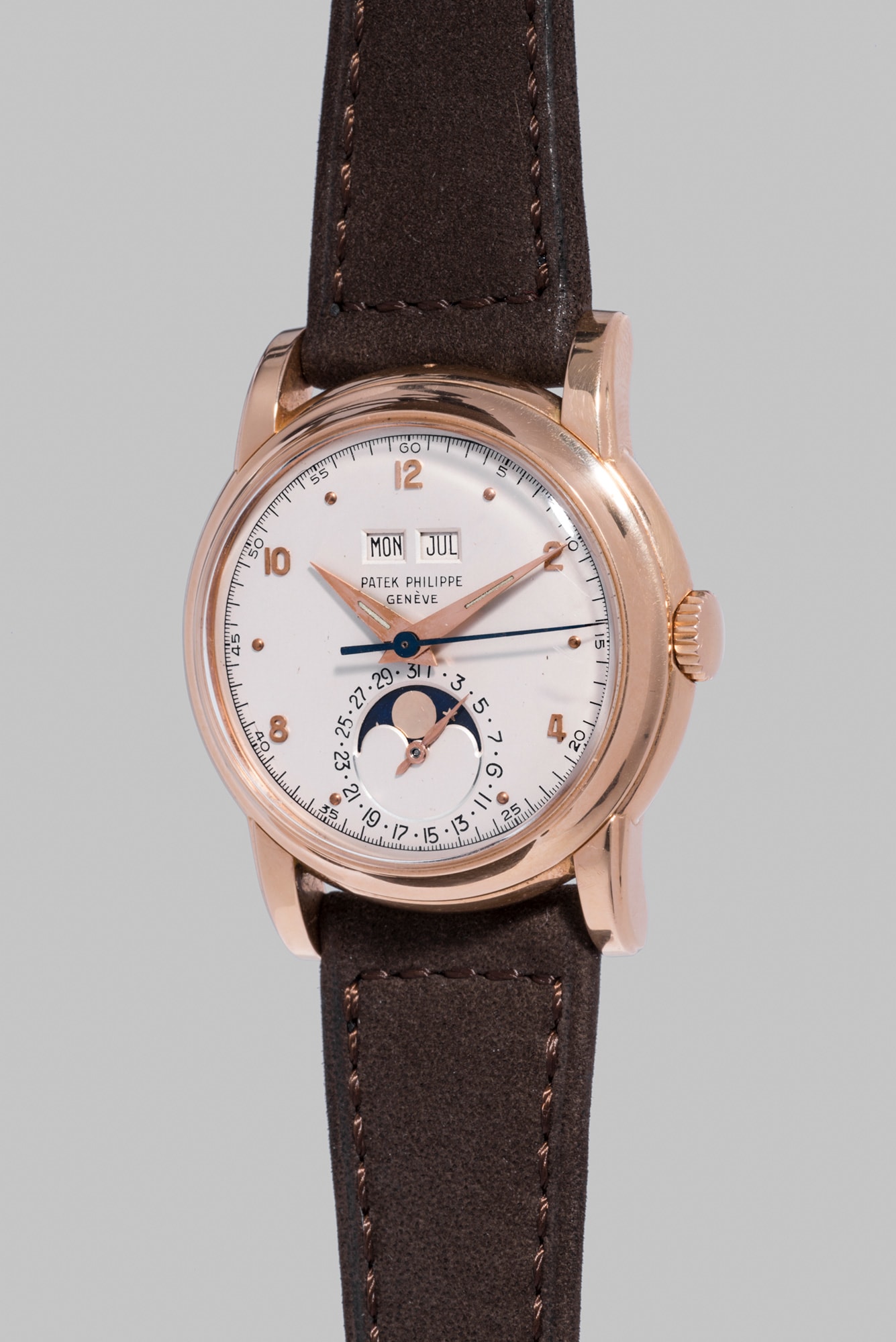 <b>PATEK PHILIPPE</b> Reference 2497, circa 1954.&nbsp; A very rare and highly attractive pink gold perpetual calendar wristwatch with moonphases, sweep center seconds and bracelet.
