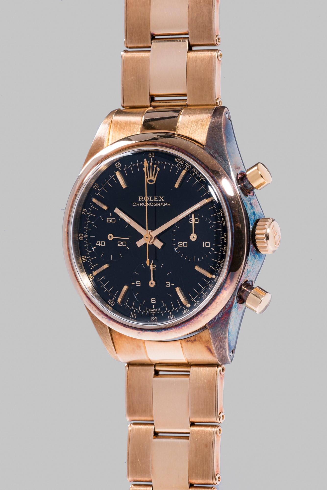 <b>ROLEX </b>Reference 6238, circa 1967. An extremely rare and highly attractive 14k yellow gold chronograph wristwatch with black galvanic dial and bracelet.