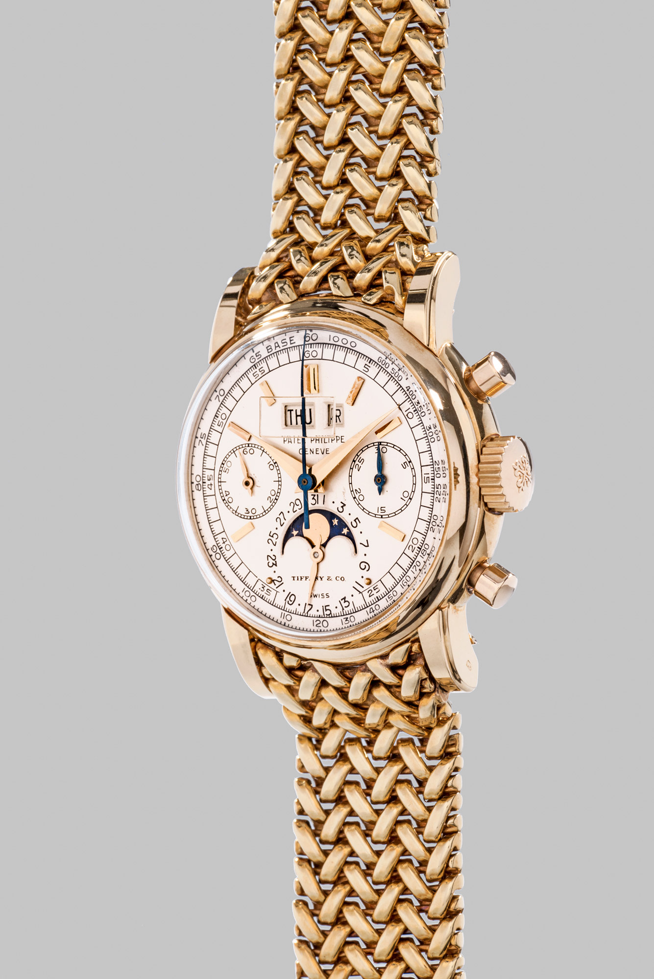 <b>PATEK PHILIPPE</b> Reference 2499, circa 1960. An extremely rare and highly important yellow gold perpetual calendar chronograph wristwatch with moonphases and bracelet, retailed by Tiffany &amp; Co.&nbsp;