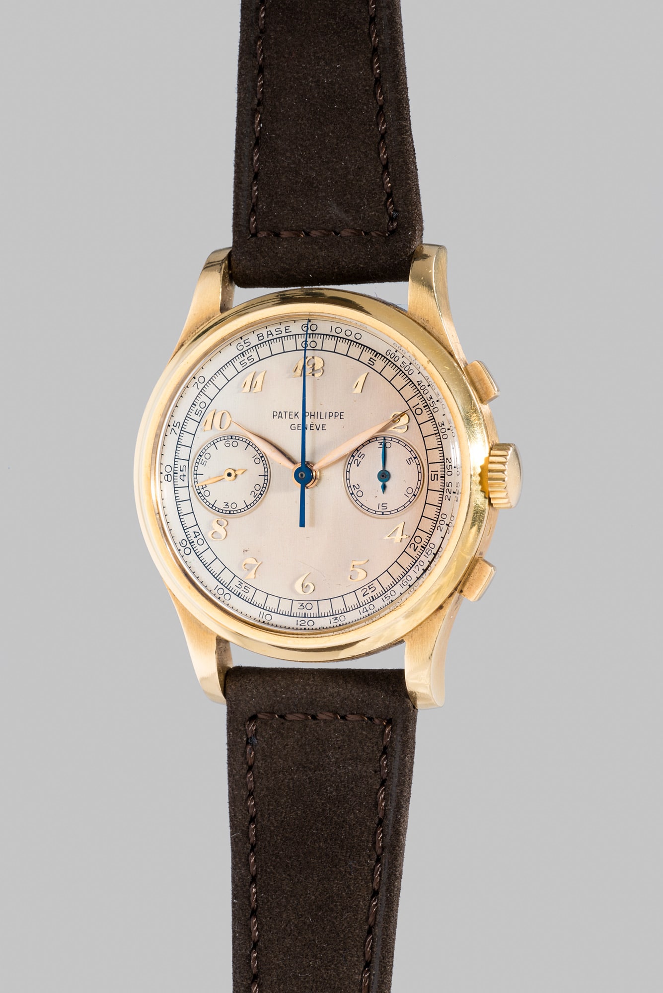<b>PATEK PHILIPPE</b> Reference 530, circa 1949. The only known, large and very attractive yellow gold chronograph wristwatch with silver dial and Breguet numerals. &nbsp;<br />