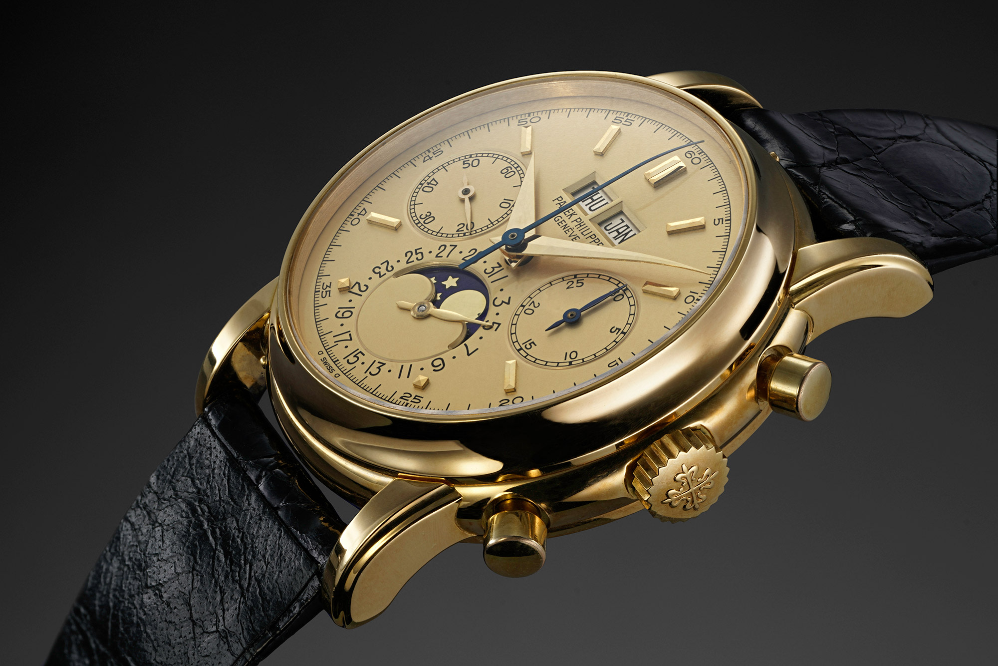 An extremely attractive and most probably unique yellow gold Patek Philippe 2499/100 with champagne dial