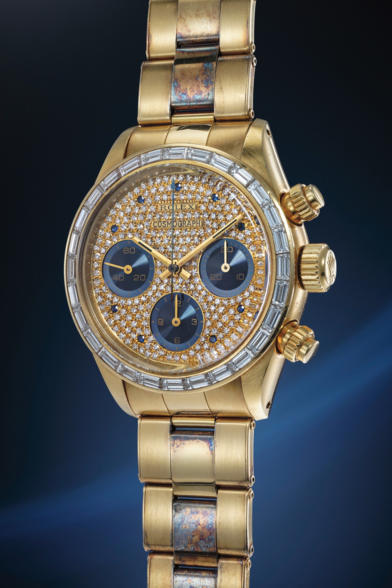 <p><strong>ROLEX</strong>, <em>Cosmograph Daytona Reference 6270 in 18K yellow gold with diamonds</em></p>
