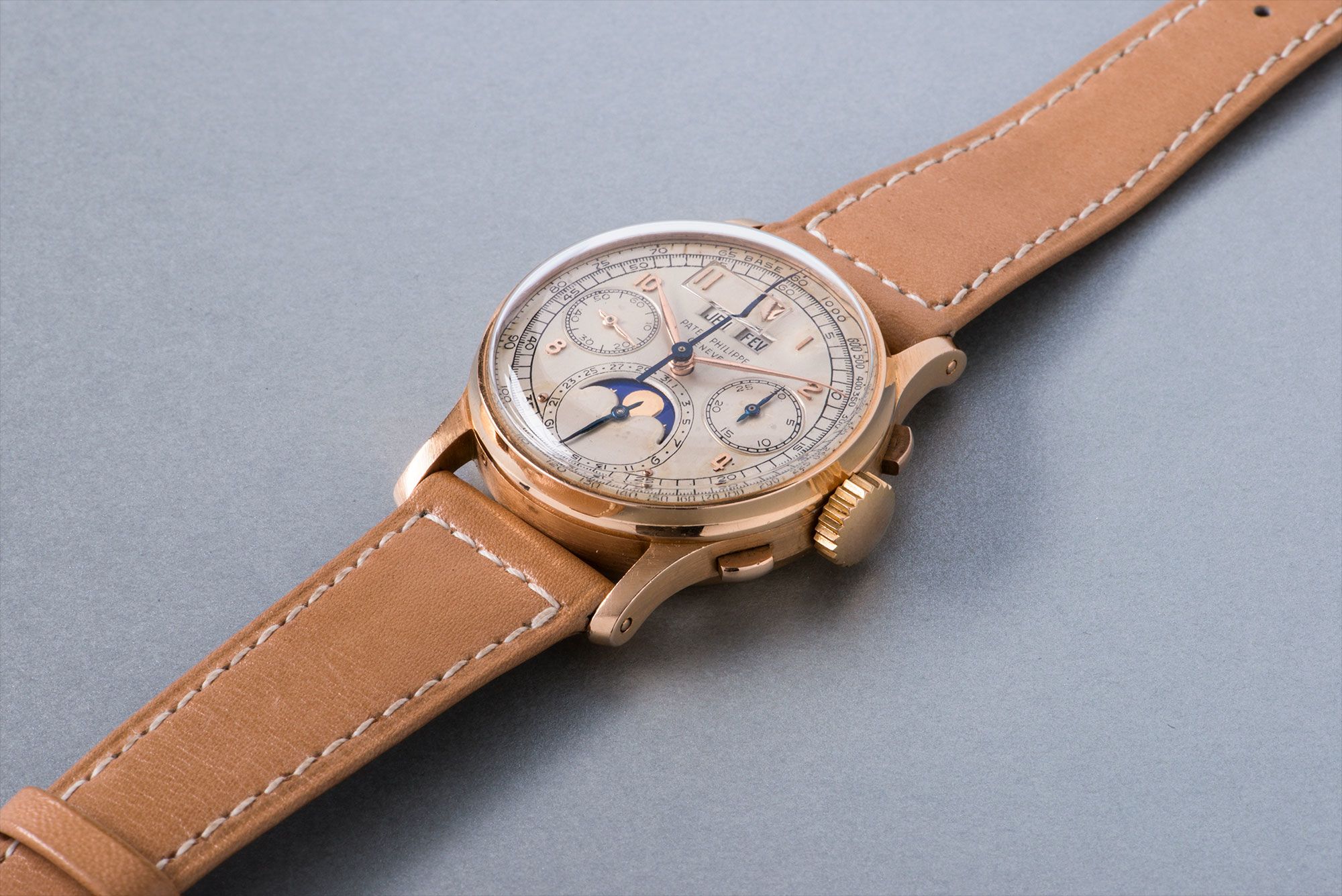 <b>PATEK PHILIPPE</b> An extremely rare and historically important pink gold perpetual calendar chronograph wristwatch with moon phases, reference 1518. Manufactured in 1948.