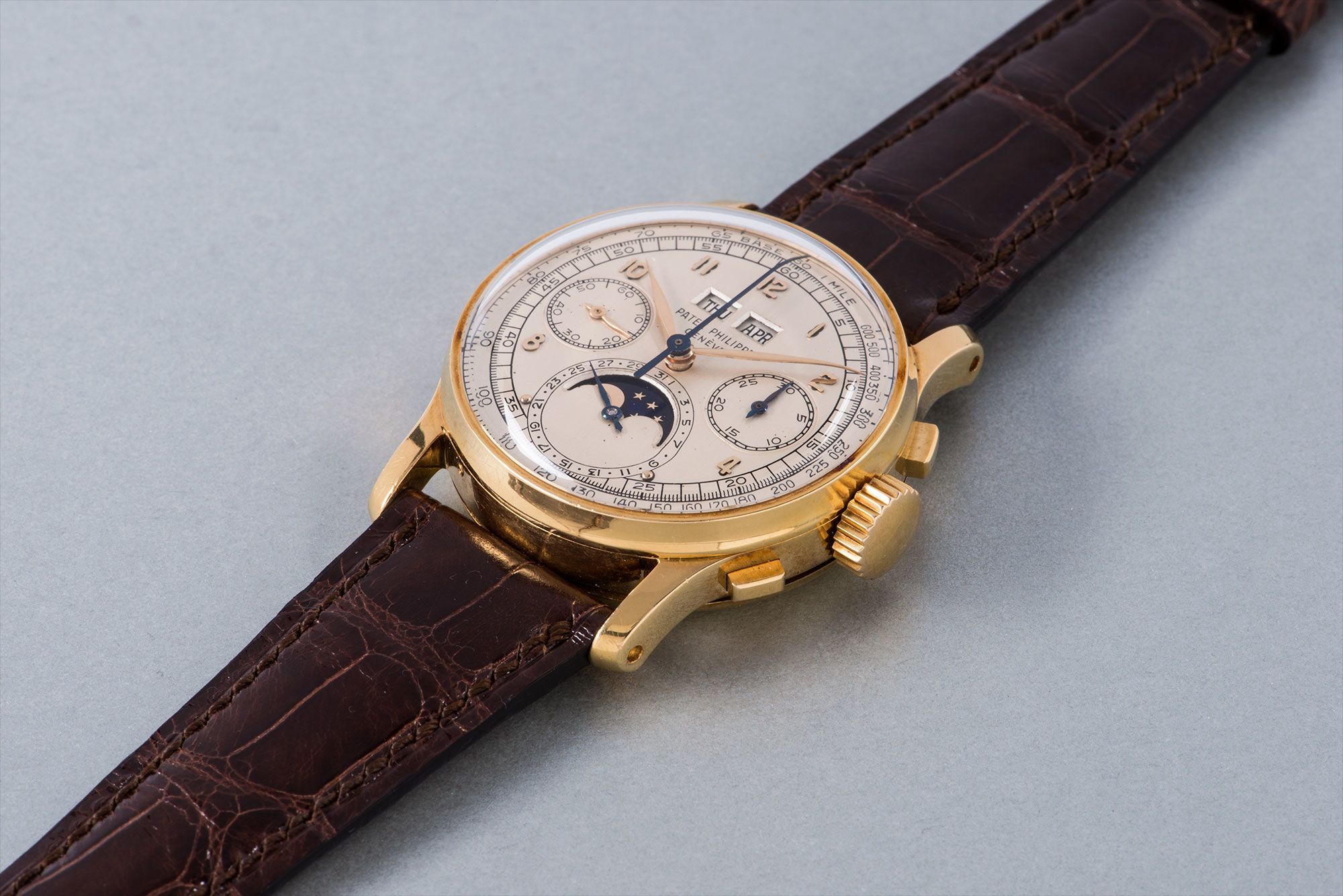 <b>PATEK PHILIPPE </b>An exceptional and very rare yellow gold perpetual calendar chronograph wristwatch with moon phases, reference 1518. Manufactured in 1951.