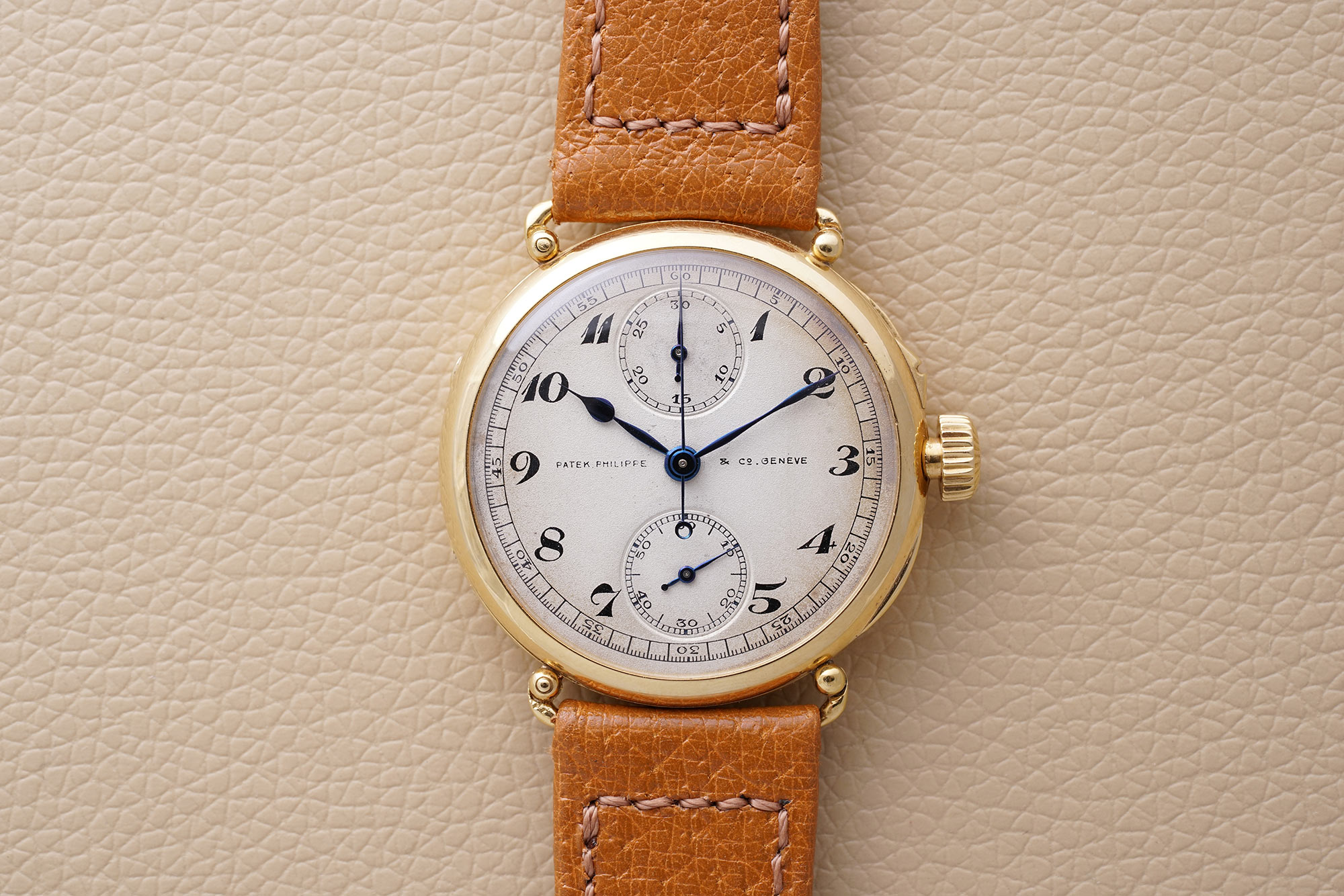 An extremely rare, well-preserved and historically important yellow gold single pusher chronograph made by Patek Philippe in 1924
