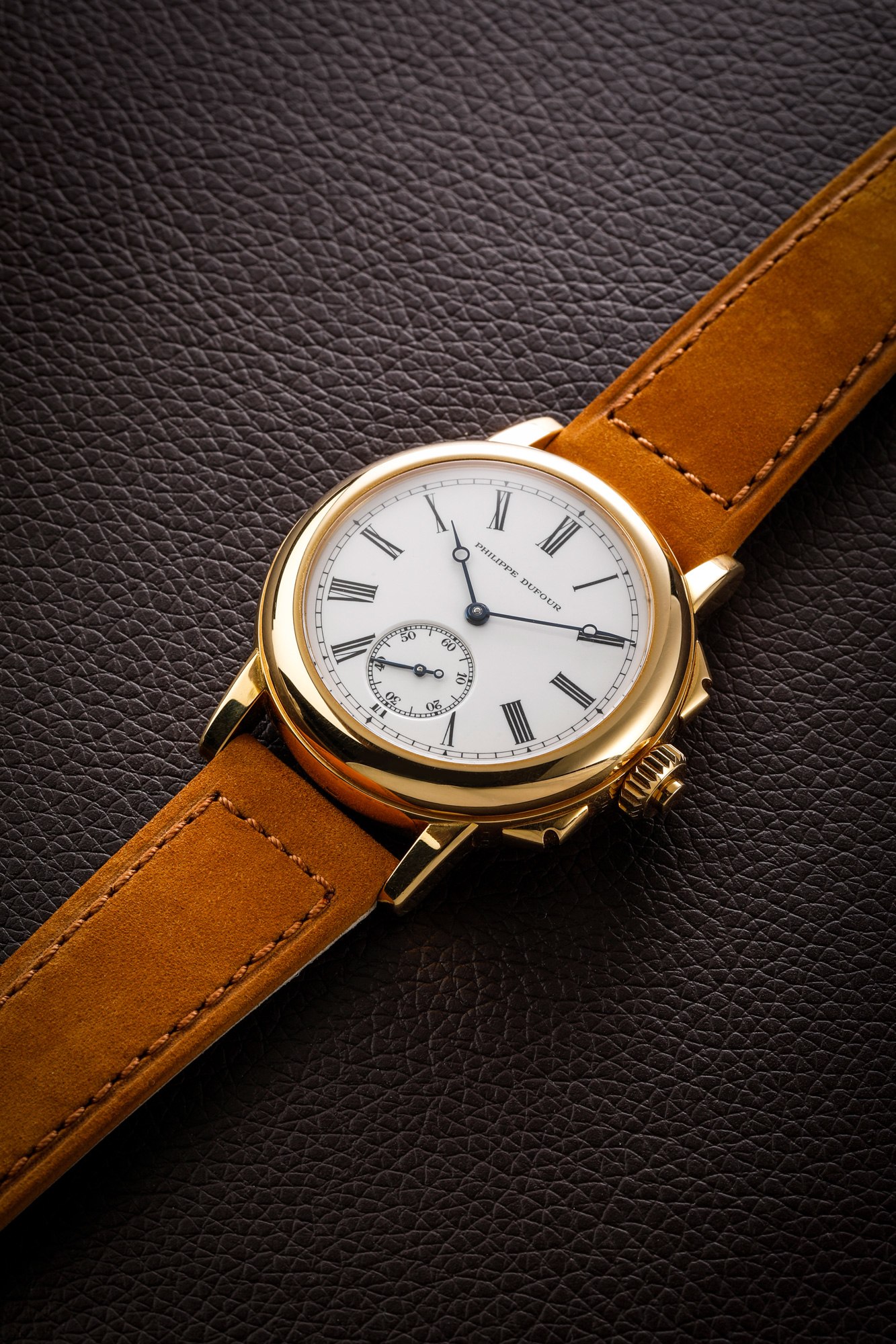 <p><strong>PHILIPPE DUFOUR</strong> A unique, incredibly well made and historically important two-train minute repeating grande and petite sonnerie wristwatch with hinged case in yellow gold and enamel dial bearing movement number 1, made in 1992.</p>
