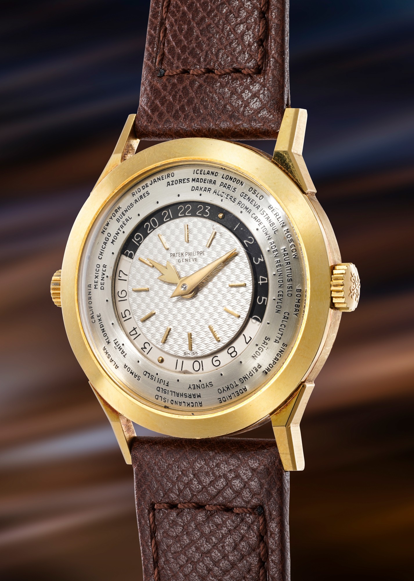 <p><strong>PATEK PHILIPPE</strong>&nbsp;<em>Ref. 2523 two-crown worldtime in yellow gold</em></p>
