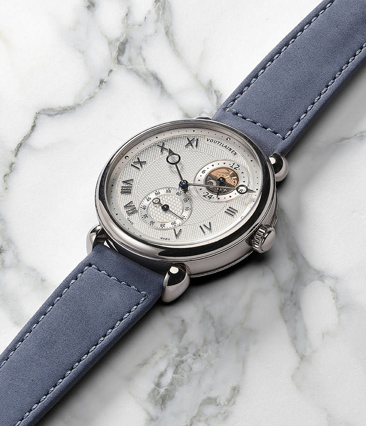 <p>A unique and superbly decorated Voutilainen, made white gold and featuring a decimal minute repeater with dual time zone indicators</p>
