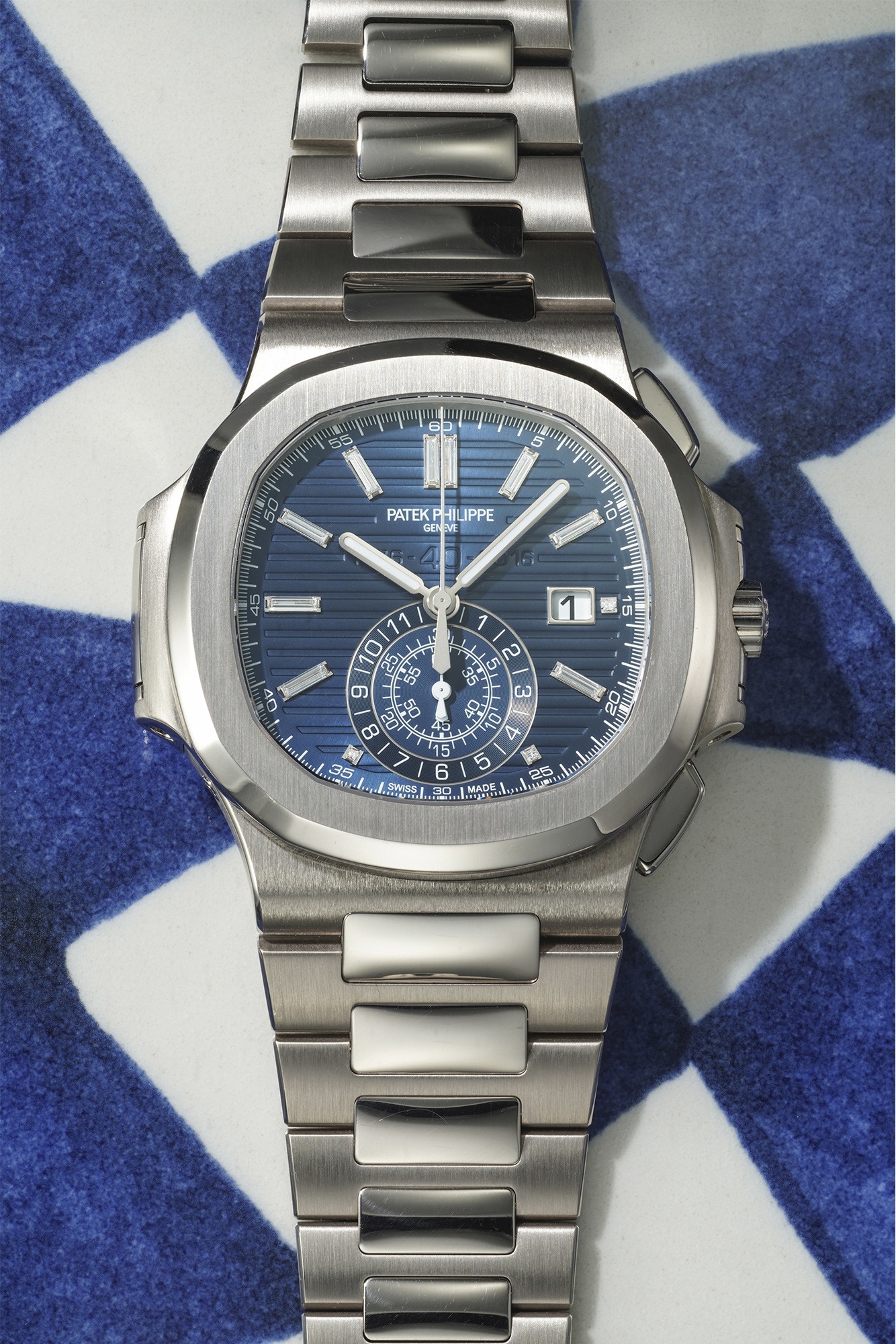 <p><strong>PATEK PHILIPPE</strong> <em>Nautilus Chronograph &ldquo;40th Anniversary&rdquo;&nbsp; Reference 5976/1G in 18k white gold, limited edition of 1,300 pieces</em></p>

