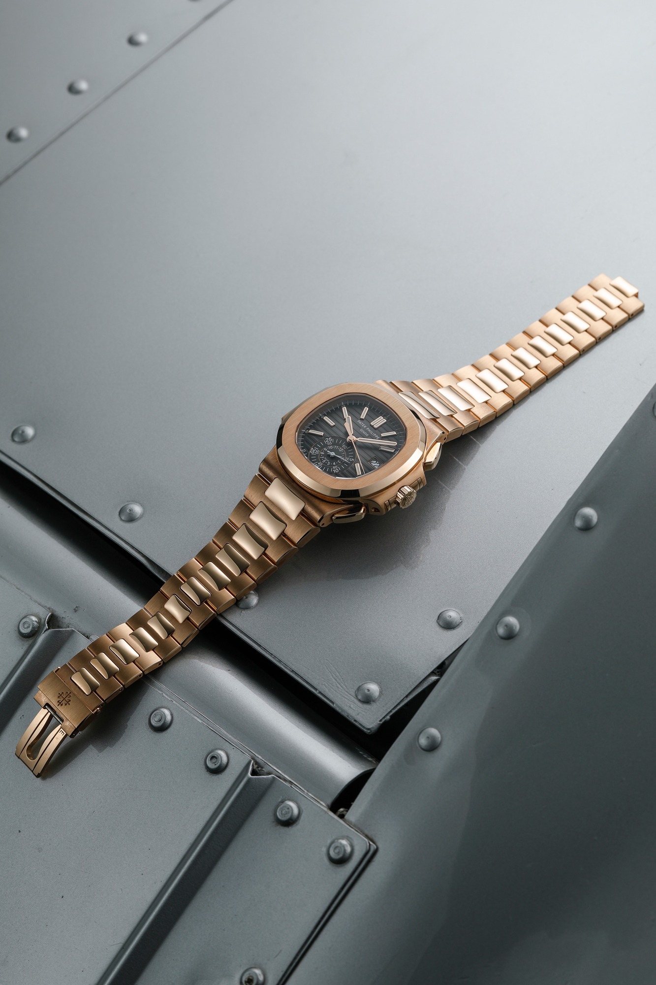 <p><strong>Patek Philippe</strong>, Ref. 5980/1R Nautilus &quot;The Boss&quot; in Pink Gold</p>
