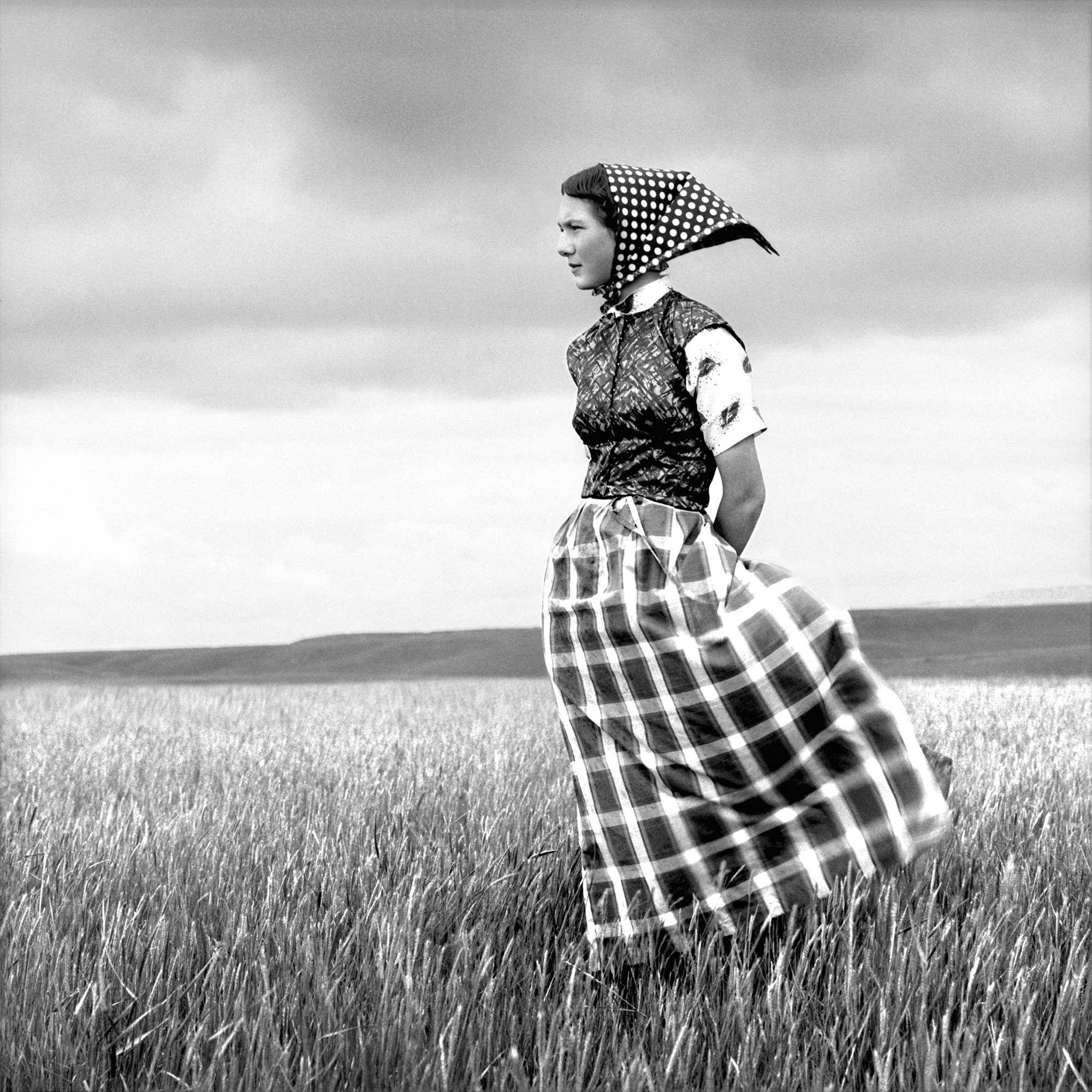 <b>LAURA WILSON</b> <i>Emma, Hutterite Girl in Field, Duncan Ranch Colony Harlowton, Montana, June 17</i>, 1994<i></i>