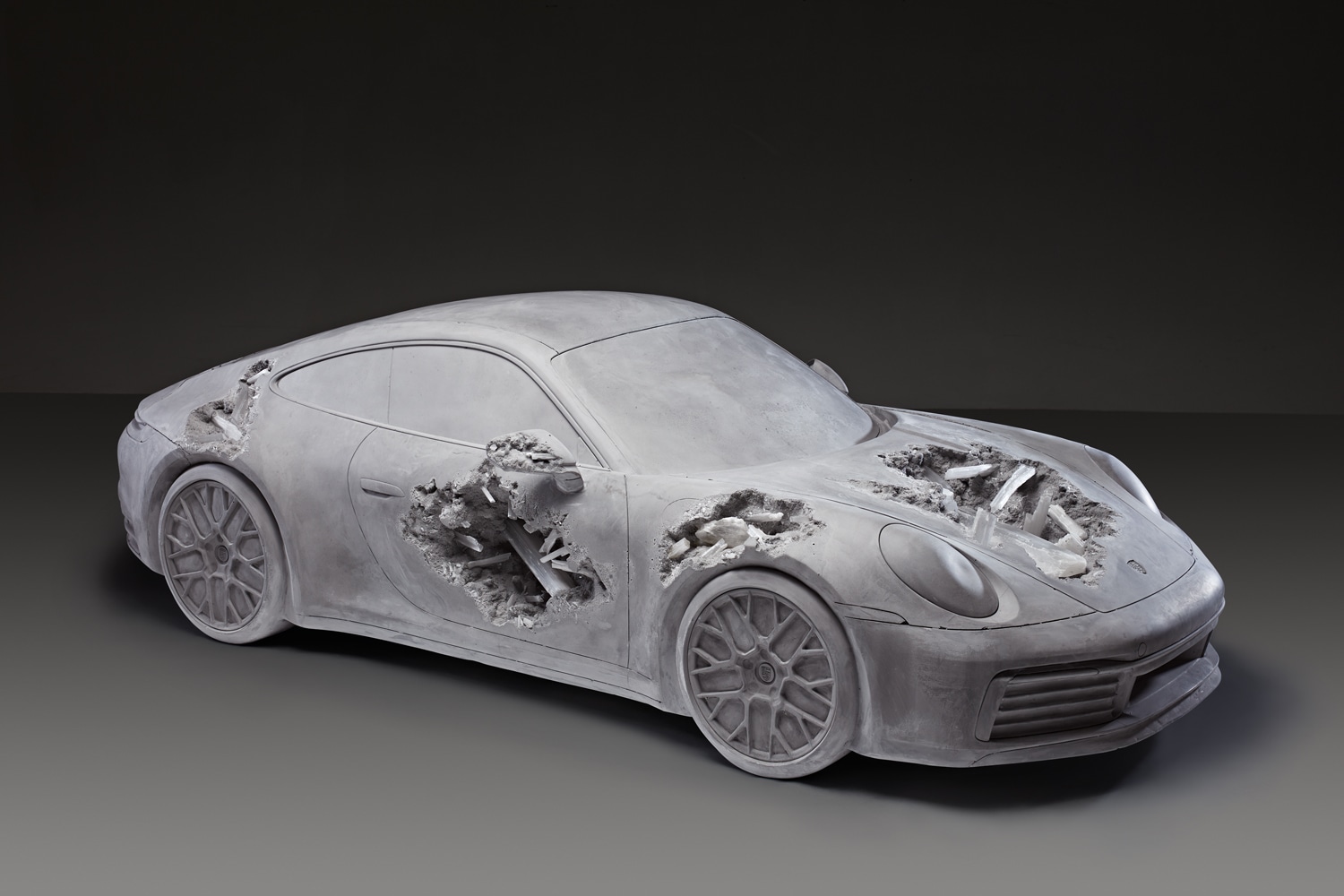 <p><strong>DANIEL ARSHAM</strong> <em>Grey Selenite Eroded Porsche</em>, 2019</p>
