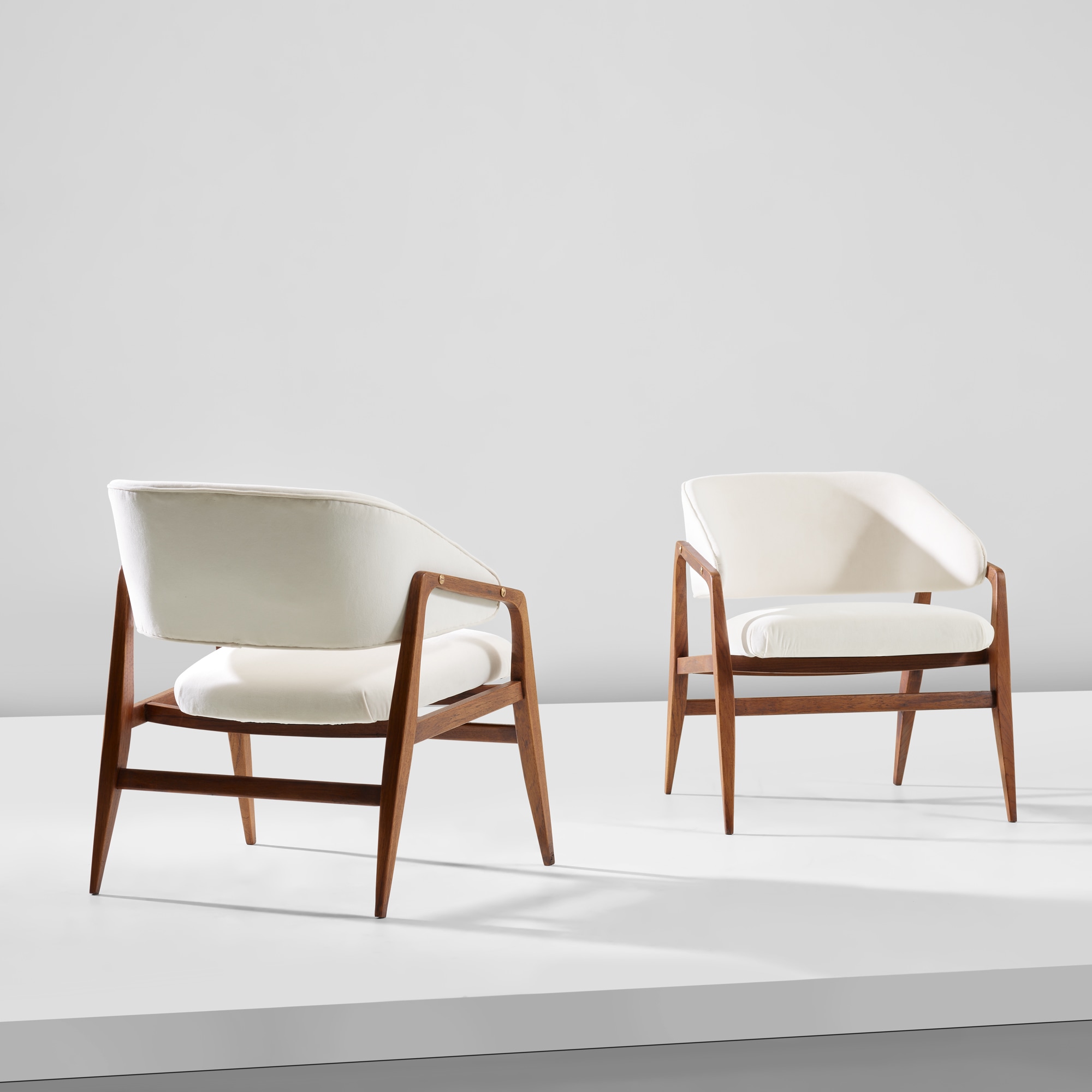 <p><strong>GIO PONTI</strong> <em>Pair of armchairs, model no. 247, from the 'Modern by Singer' series</em>, circa 1953</p>