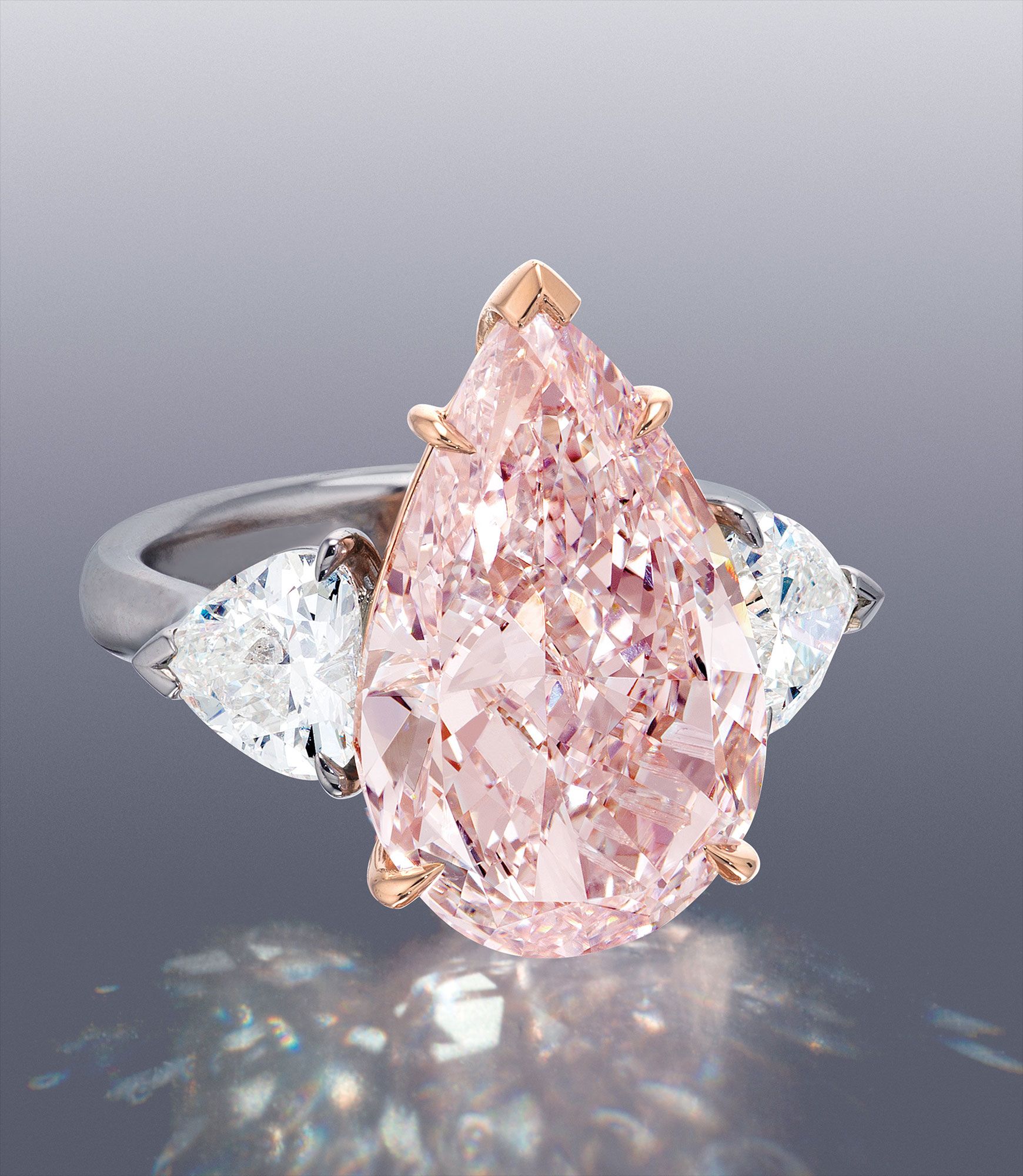 An Important and Rare Fancy Pink Diamond and Diamond Ring