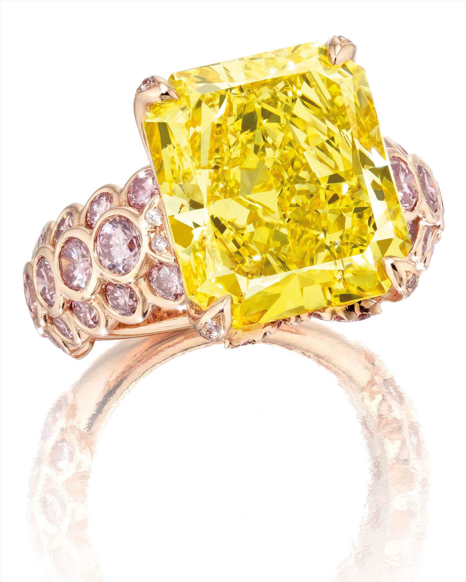 A Fine Fancy Vivid Yellow Diamond and Pink Diamond Ring