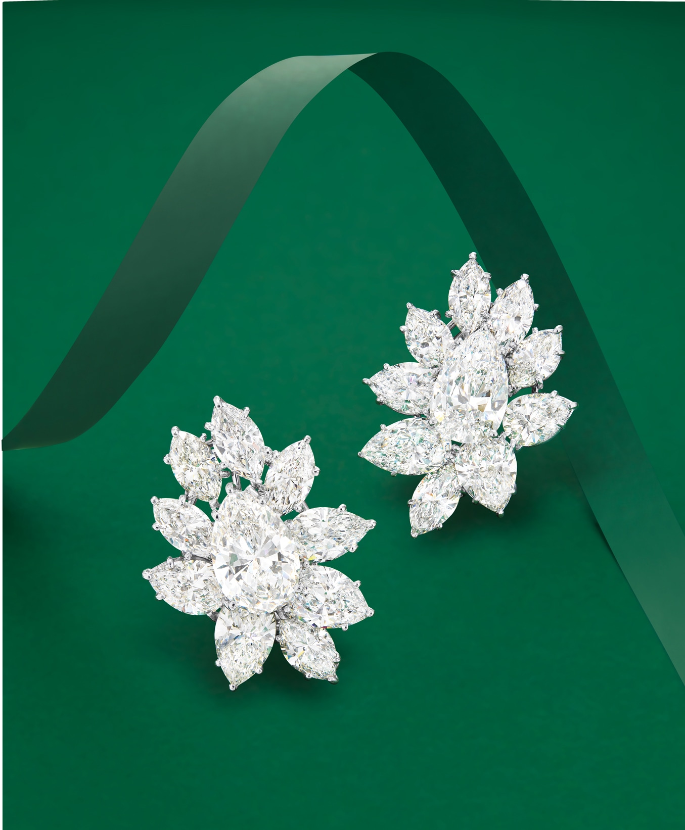 <p><strong>HARRY WINSTON&nbsp;</strong>A Classic Pair of Diamond Cluster Ear Clips</p>
