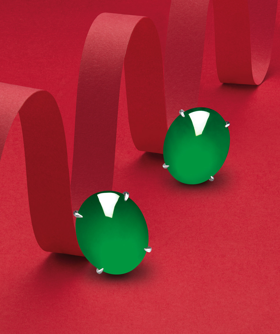<p>&nbsp;A Very Fine Pair of Jadeite Cabochon Earrings</p>
