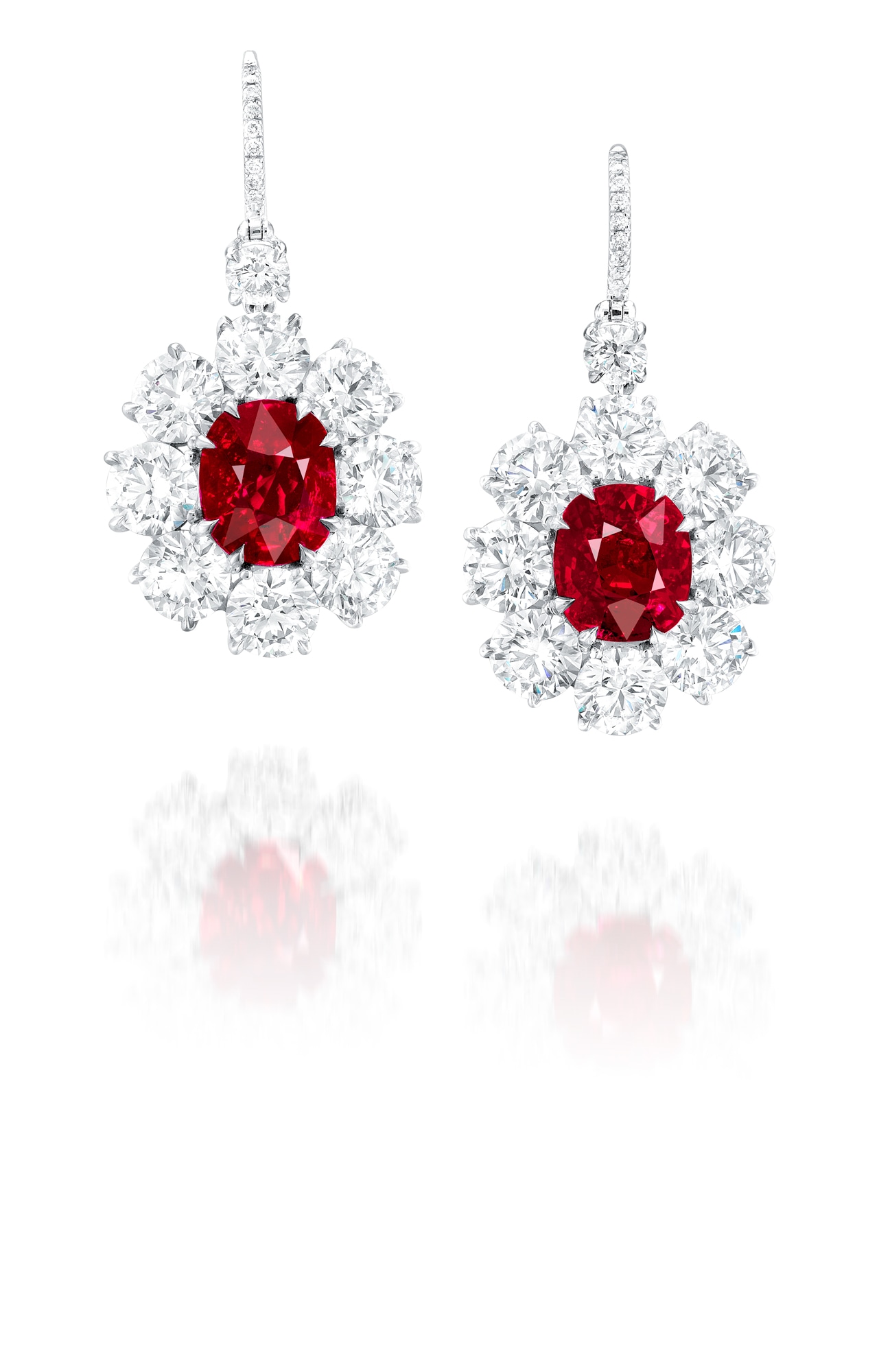 <p>A Pair of 4.03 and 4.04 carat Burmese "Pigeon's blood" Ruby and Diamond Earrings</p>