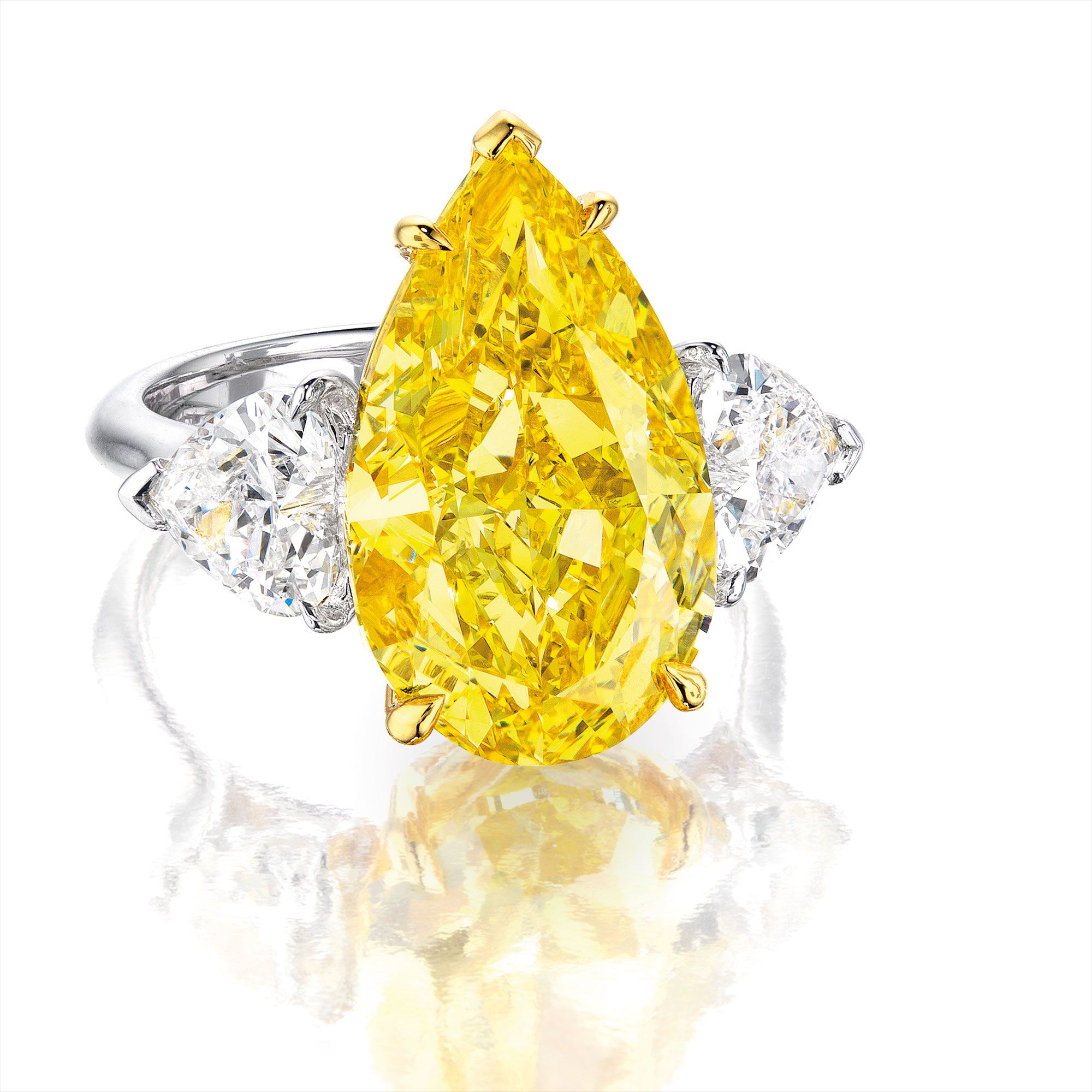The Golden Drop - A Fancy Vivid Yellow Diamond and Diamond Ring