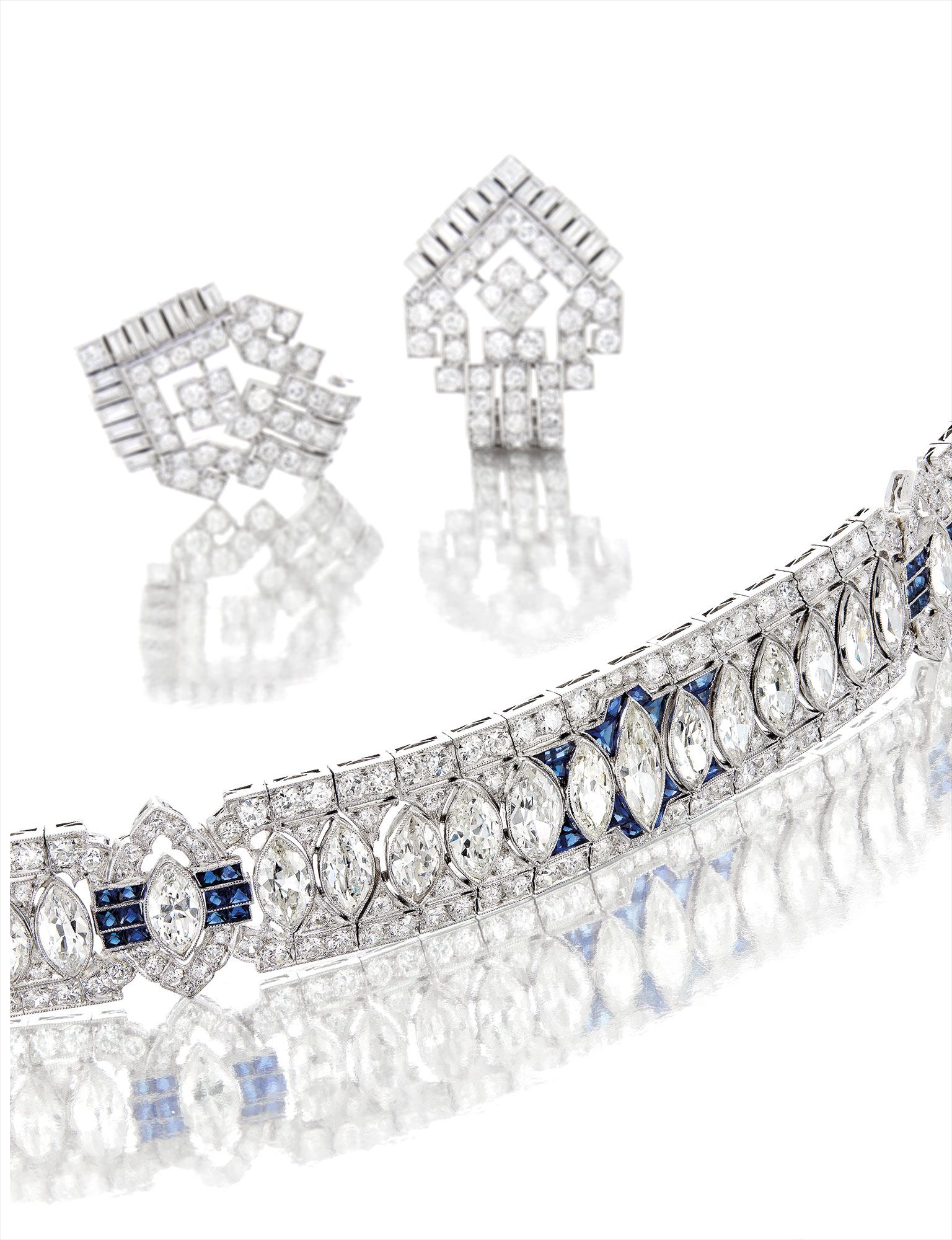 <b>CARTIER </b>An Art Deco Sapphire and Diamond Bracelet, Cartier, circa 1925 & An Art Deco Diamond Double-clip Brooch, Cartier London, circa 1930