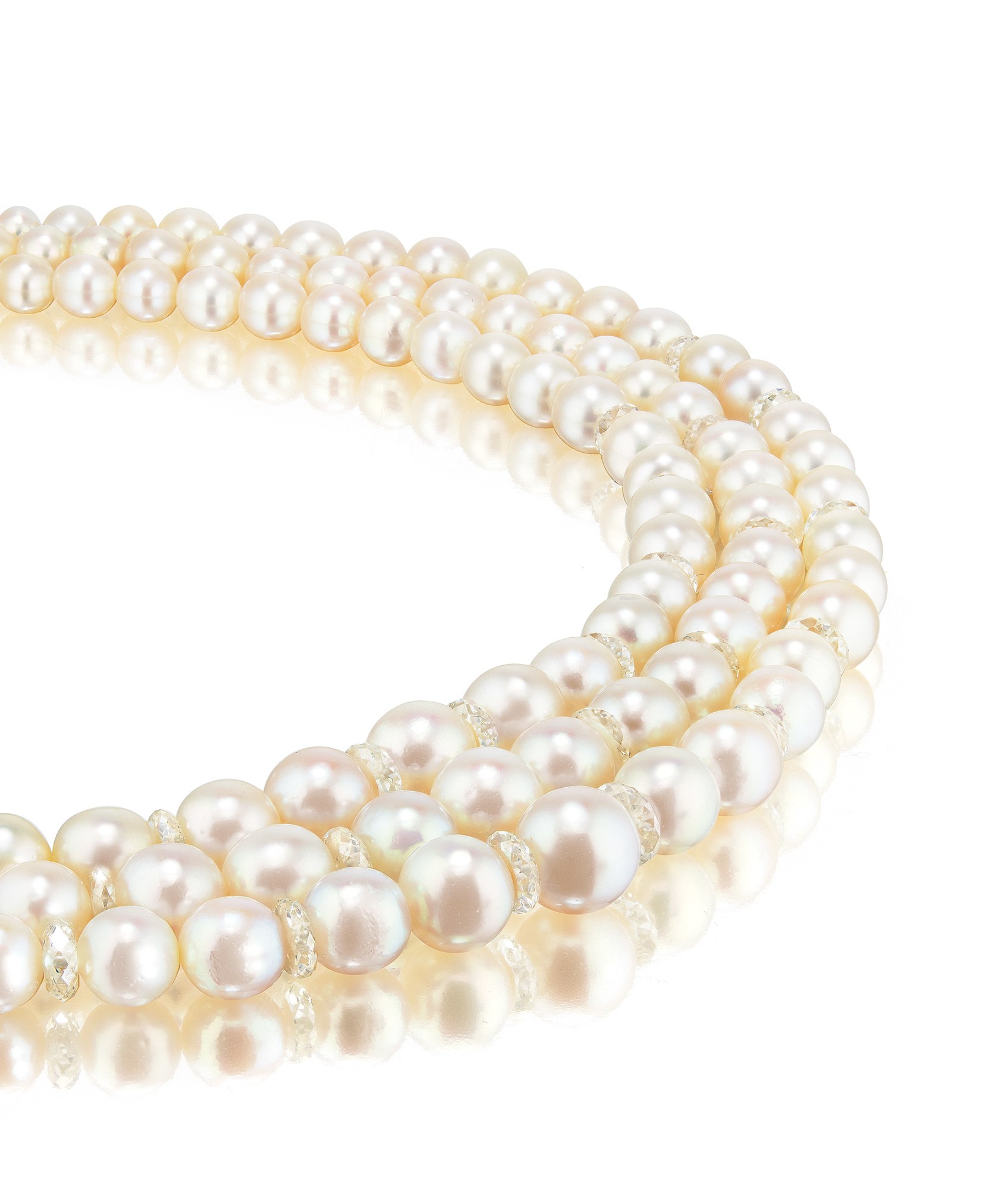 A Very Fine Natural Pearl and Diamond Triple-strand Necklace, Clasp signed Verdura Paris
