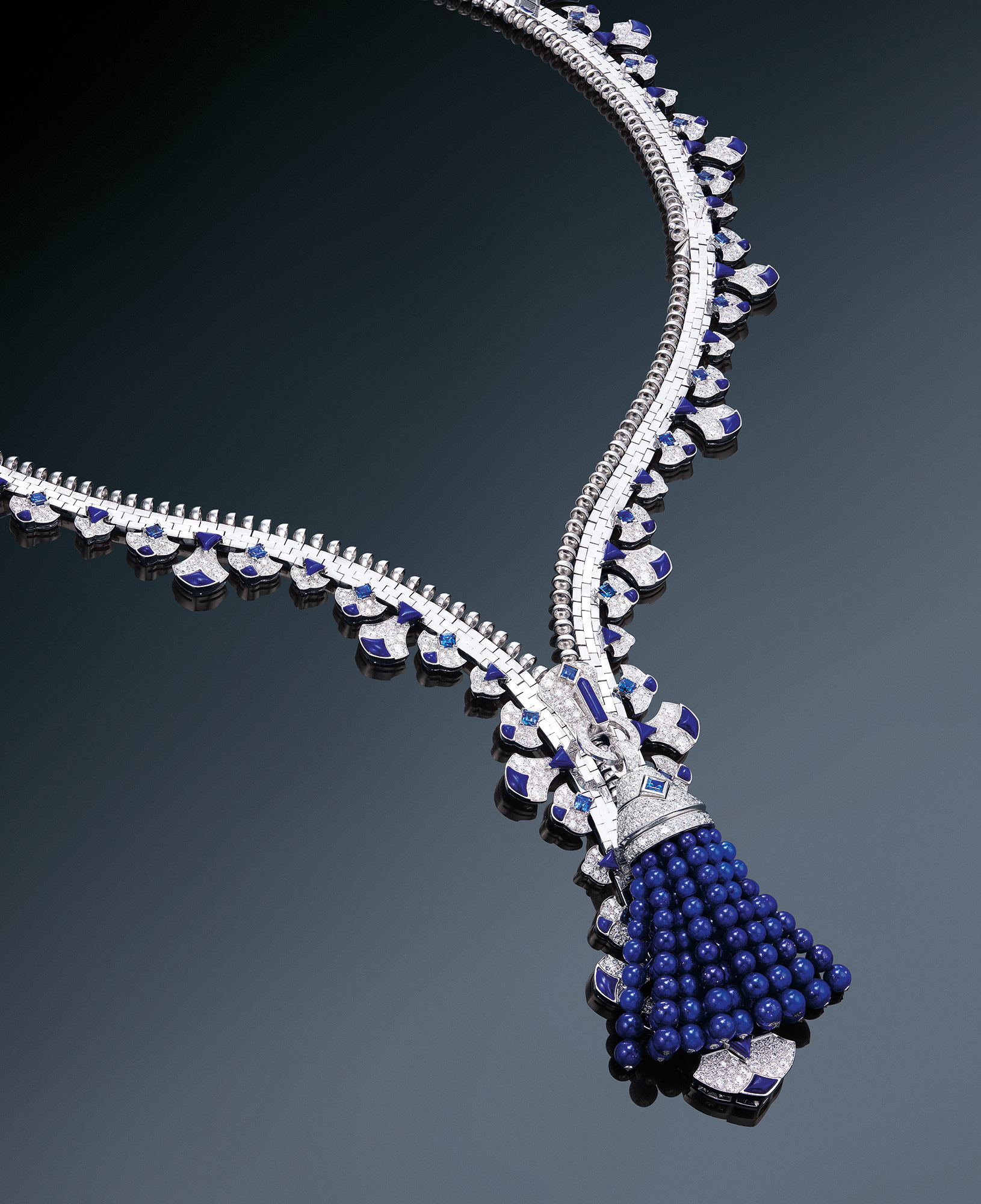 <p>An Elegant and Iconic Lapis Lazuli, Sapphire and Diamond 'Zip' Necklace, Van Cleef & Arpels</p>