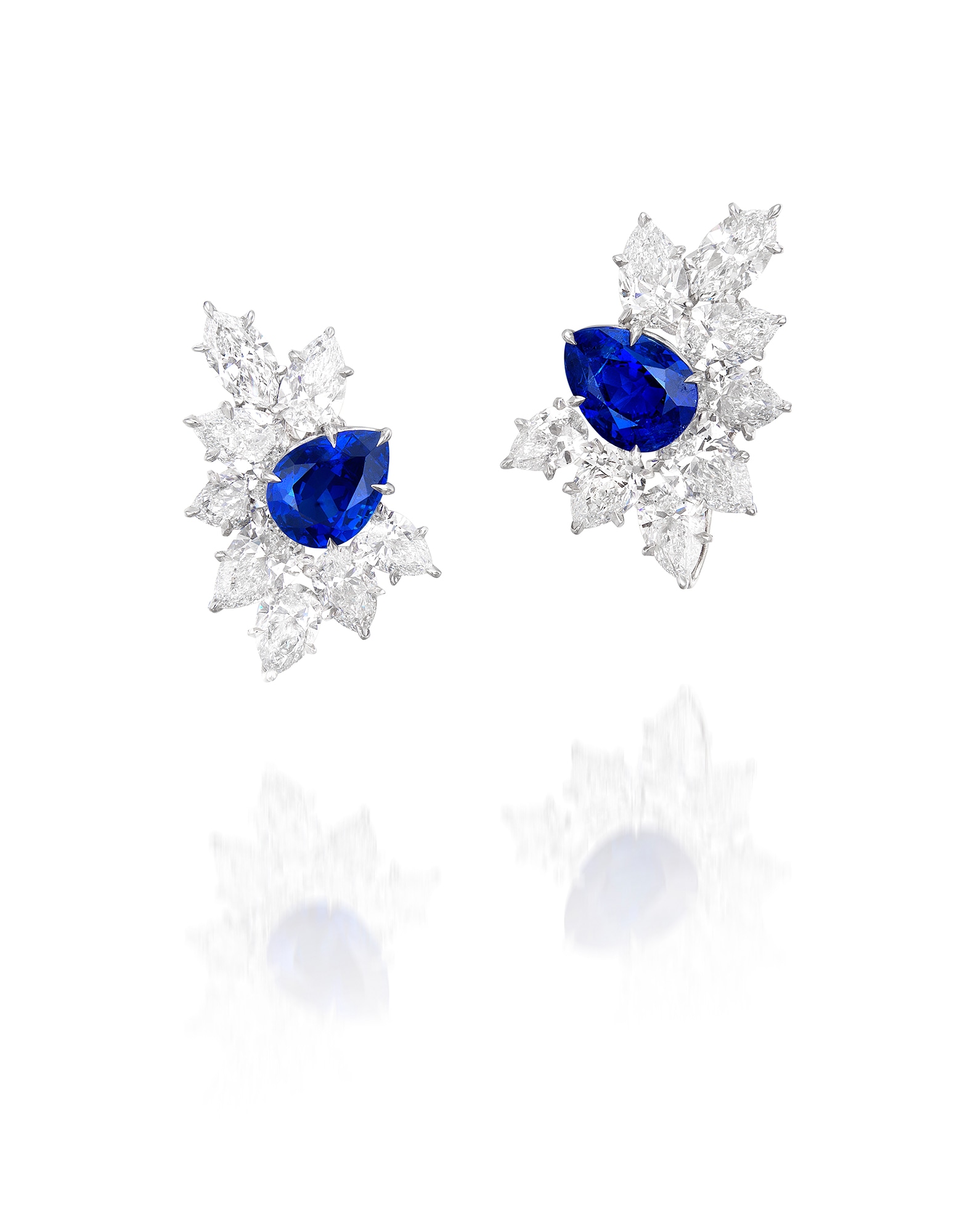 <p><strong>HARRY WINSTON</strong>, A Pair of 4.25 and 5.20 carat Sapphire and Diamond Earrings&nbsp;</p>
