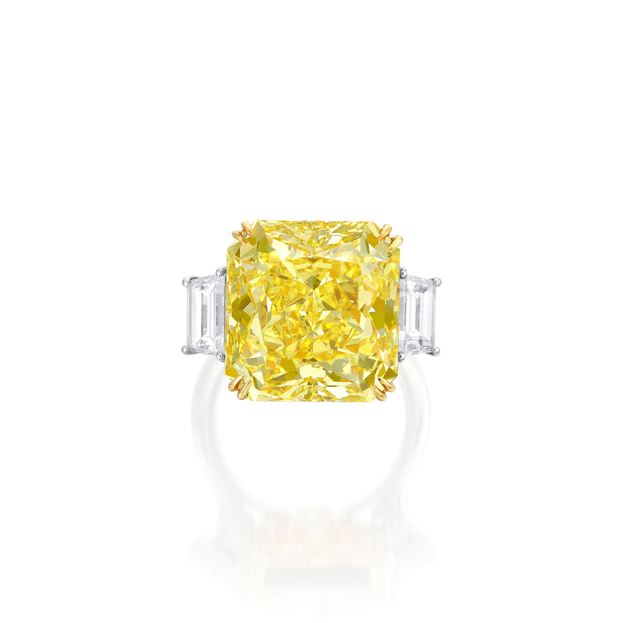 <p><em>Fancy Vivid Yellow Diamond and Diamond Ring</em></p>
