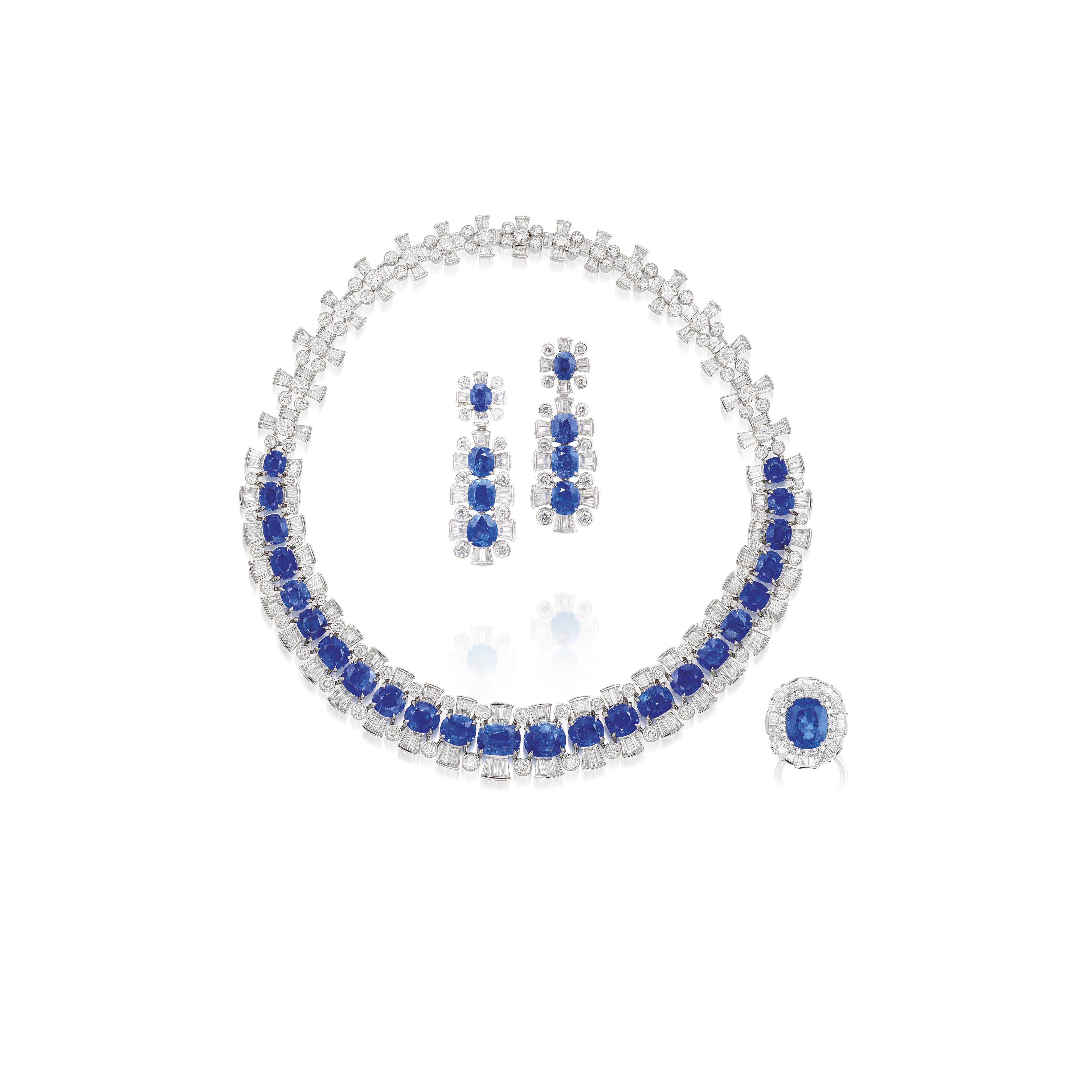 <p>A Set of Burmese Sapphire and Diamond Necklace, Ring and Earrings</p>