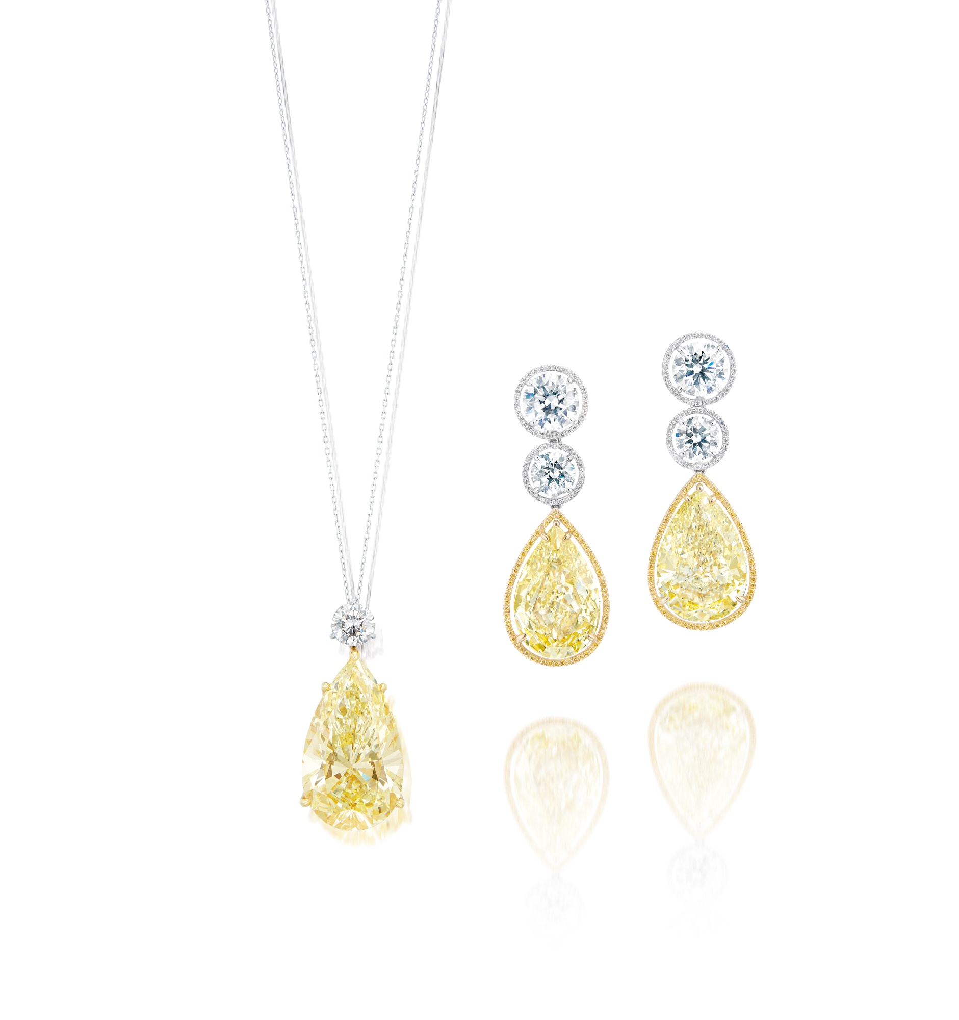 <p>A Set of Fancy Yellow Diamond and Diamond Pendant Necklace and Earrings</p>