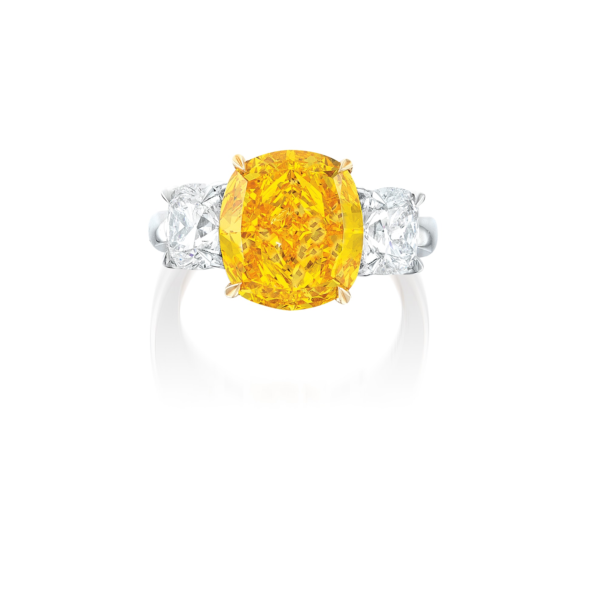 <p>A 5.06 carat Fancy Vivid Orange-Yellow Diamond and Diamond Ring </p>