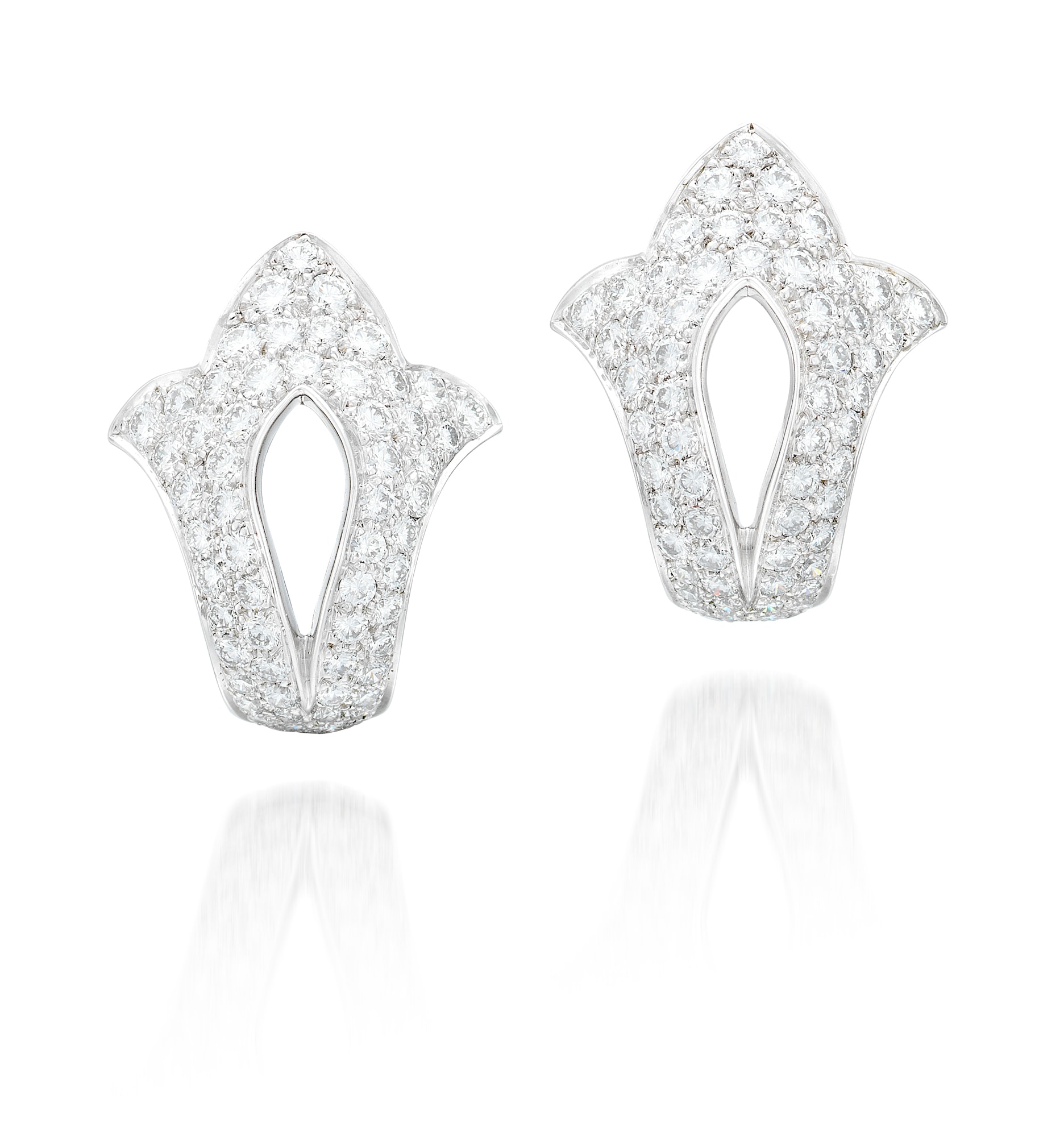 <p><strong>CARTIER</strong>, A Pair of Diamond Ear Clips</p>
