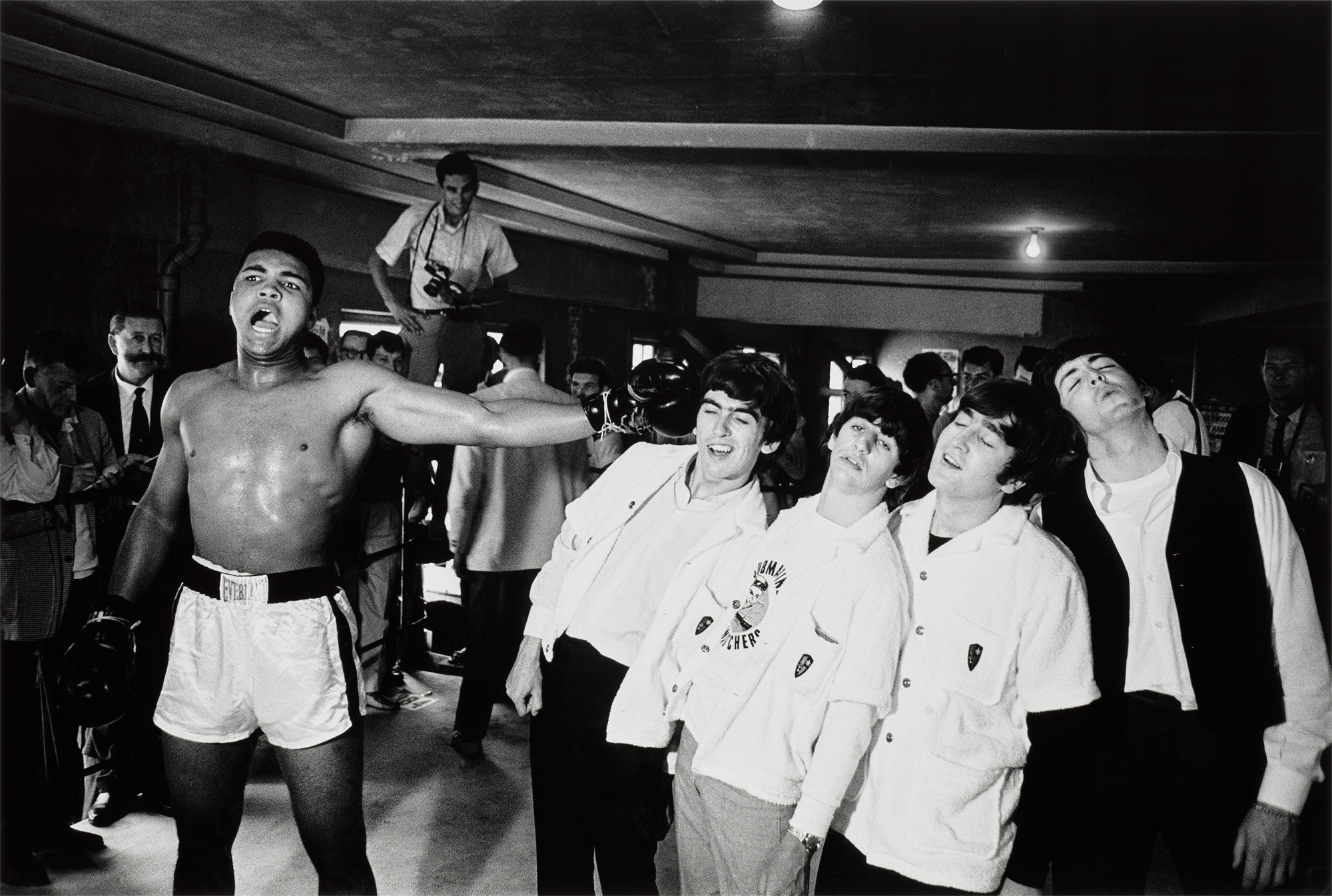 <p><strong>CHRIS SMITH</strong><em>&nbsp;Ali and The Beatles</em>, 1964</p>
