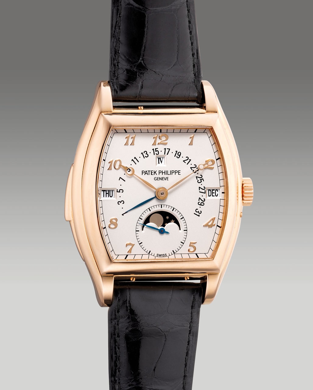 <p><strong>PATEK PHILIPPE</strong> reference 5013R Minute Repeater Perpetual Calendar, an extremely fne and impressive pink gold tonneau-shaped minute repeating perpetual calendar wristwatch with moon phases, retrograde date, leap year indication and Breguet numerals, circa 2000</p>
