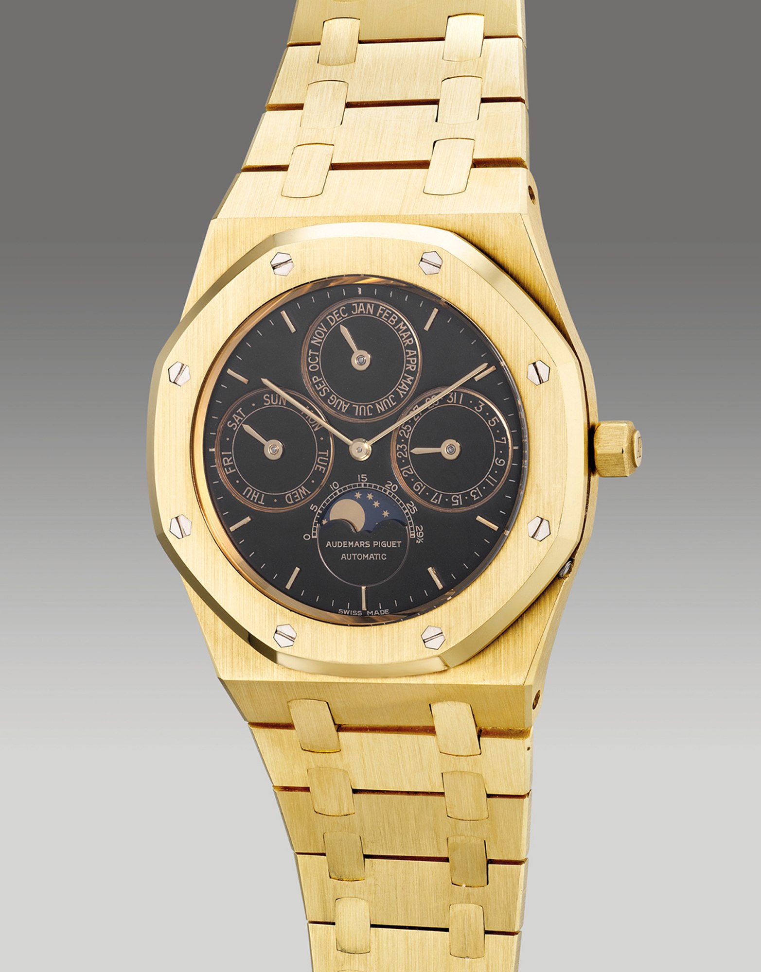 <p><strong>AUDEMARS PIGUET</strong> <em>Ref. 25554BA yellow gold perpetual calendar wristwatch with black dial</em>, Circa 1986</p>