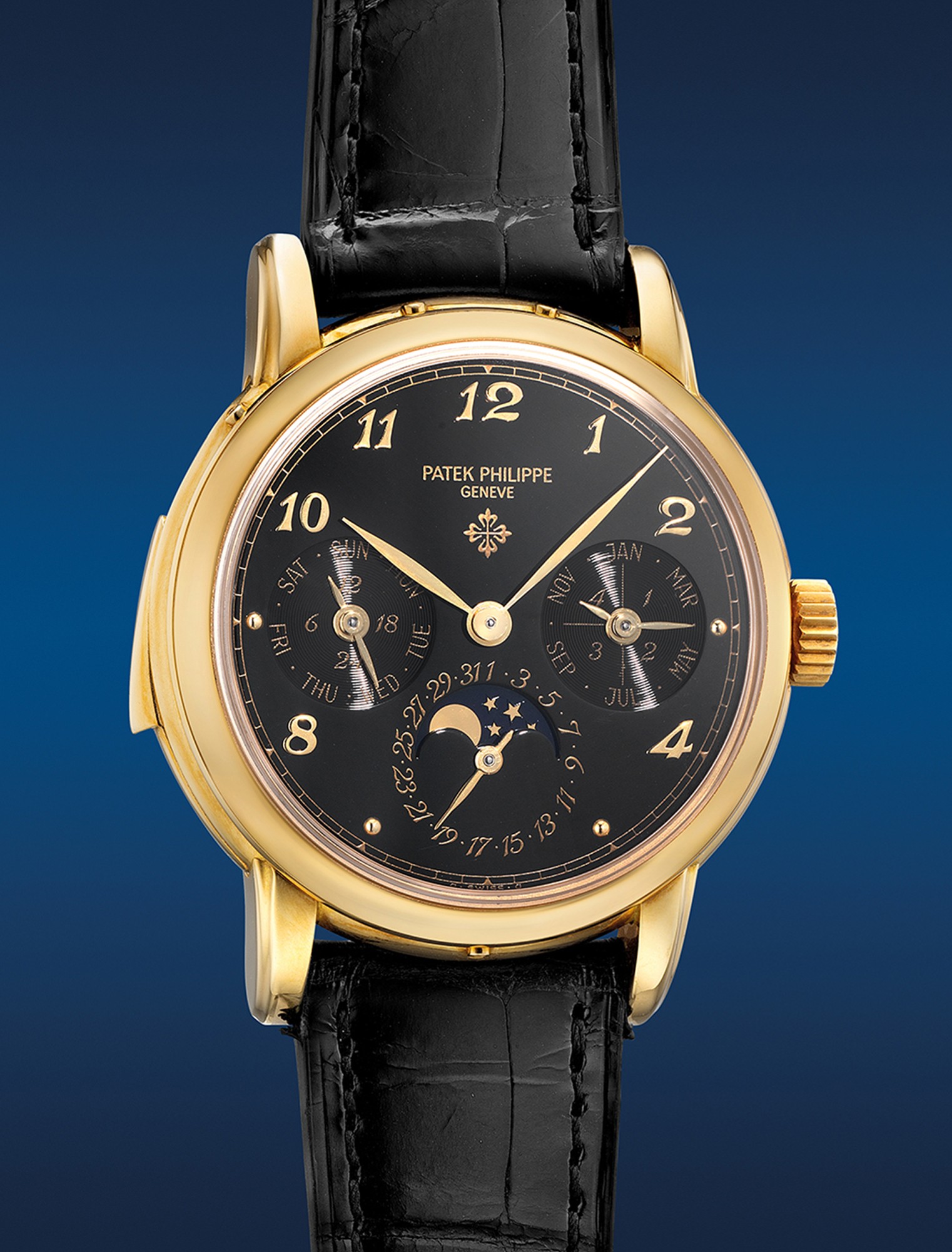 <p><strong>PATEK PHILIPPE</strong>, Ref. 3974. A superbly attractive, very important and possibly unique yellow gold minute repeating perpetual calendar wristwatch with moon phases, leap year indication, glossy black lacquered dial, applied Breguet numerals, and Calatrava cross logo</p>

