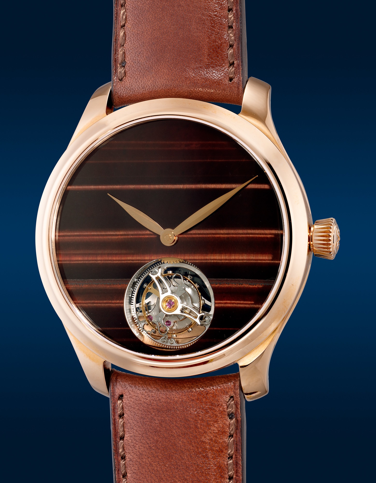 <p><strong>H. MOSER & CIE</strong> <em>Endeavour Tourbillon Concept Ref. 1804-0401, limited edition pink gold flying tourbillon wristwatch with Ox’s eye dial, one of a limited edition of 50 pieces</em></p>