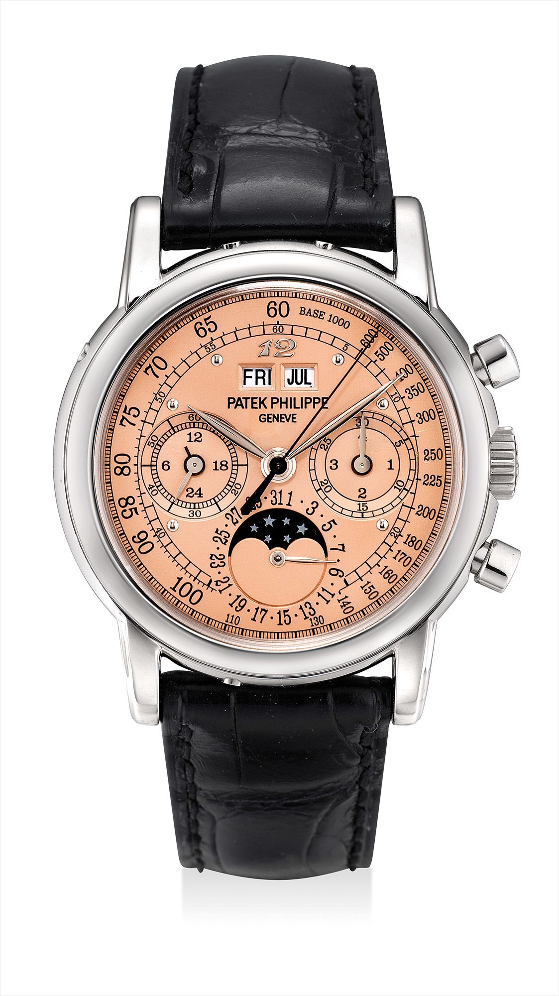 <b>PATEK PHILIPPE </b>An extremely fine and important white gold perpetual calendar chronograph reference 3970 wristwatch with moon phases, 24 hours, leap year indicator, special salmon tachymetre dial, Breguet numeral at 12 o'clock, original certificate, additional case back and fitted presentation box, formerly in the collection of Eric Clapton, CBE, manufactured in 2008.