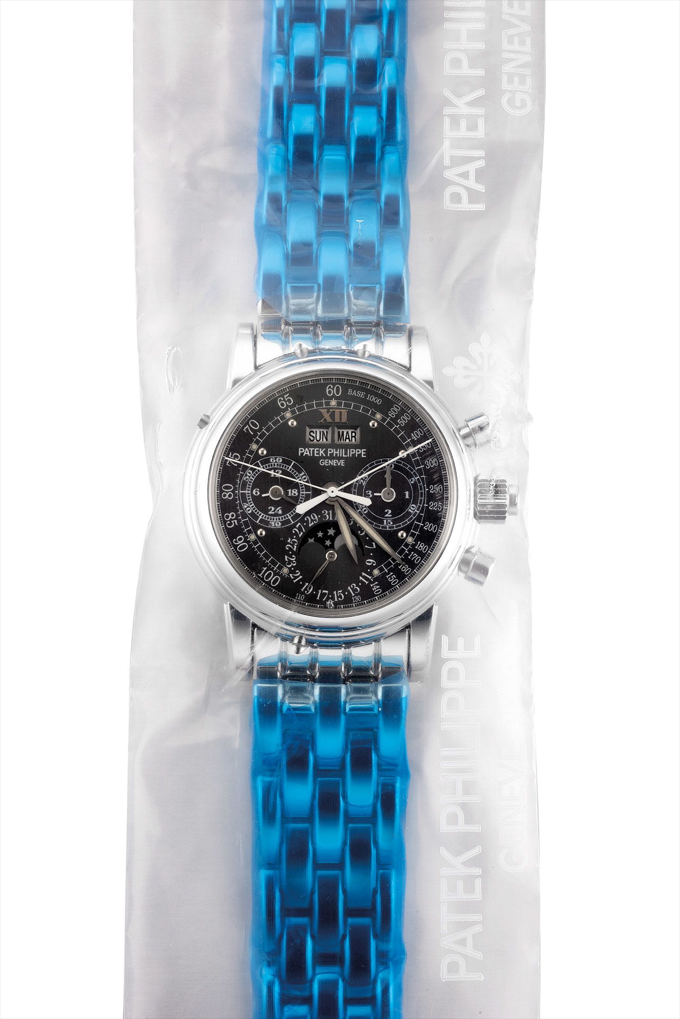 <b>PATEK PHILIPPE </b>An unique and very important white gold perpetual calendar split seconds chronograph wristwatch with moon phases, special monogram dial, bracelet, certificate, second case back and presentation box, made for an important Patek Philippe collector. <br />
Ref. 5004. Manufactured in 2011.