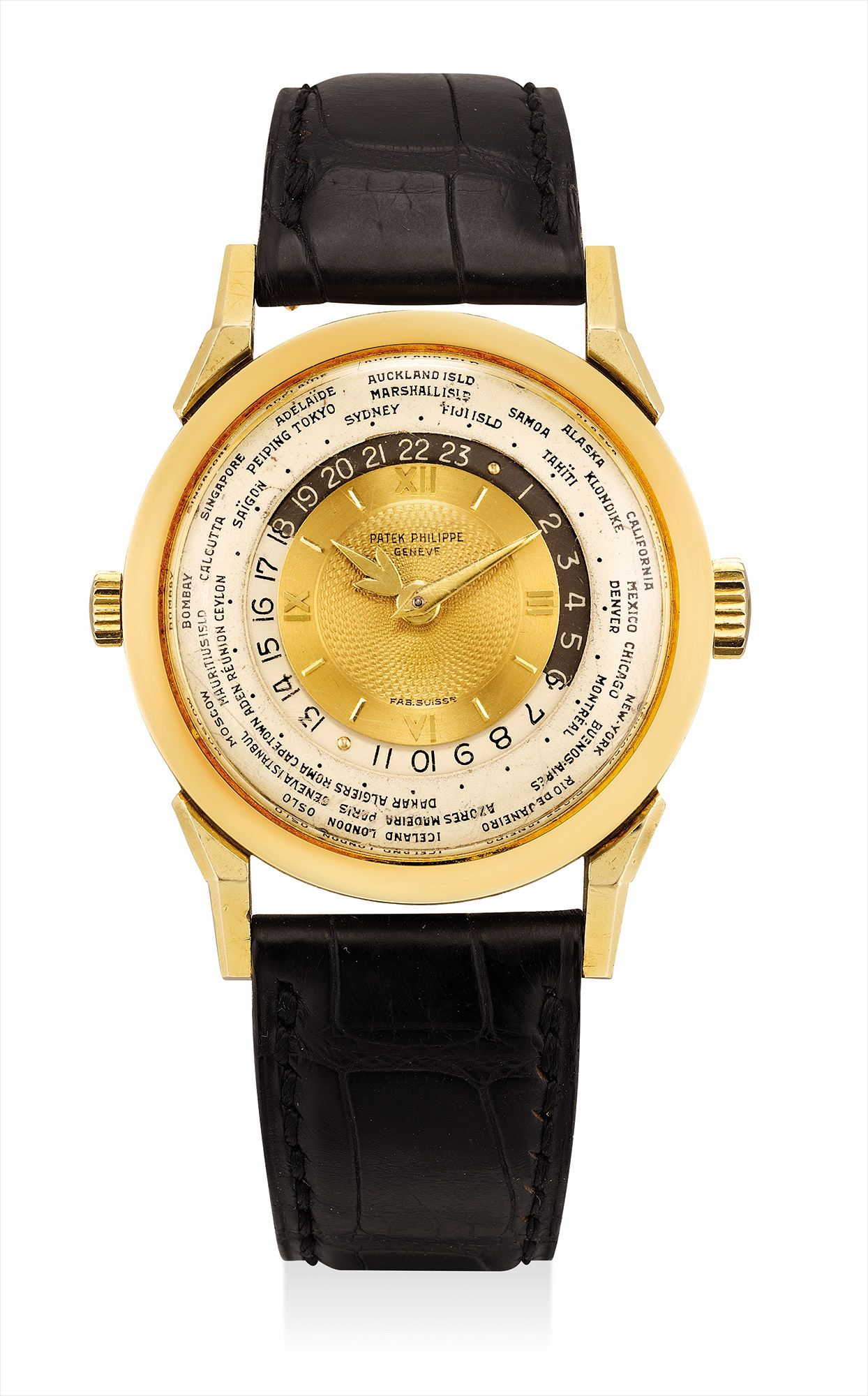 <b>PATEK PHILIPPE </b>A superlative, highly important and extremely rare gold world-time wristwatch with engine turned dial. Ref. 2523. Manufactured in 1953.