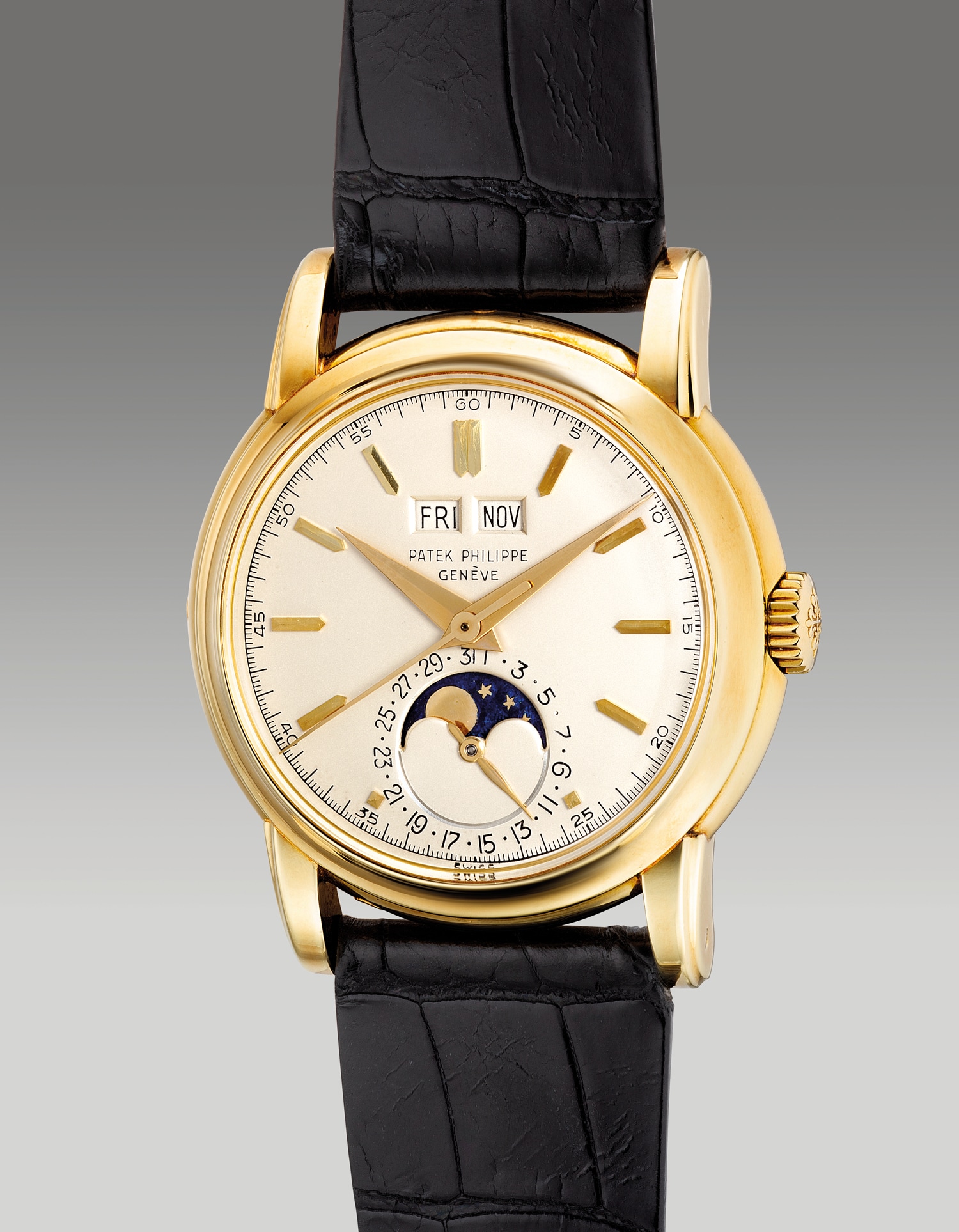 <p><strong>PATEK PHILLIPE</strong> ref.2438 - A very fine and extremely rare yellow gold perpetual calendar wristwatch with center seconds, moon phases, screw-down caseback and presentation box, circa 1955</p>