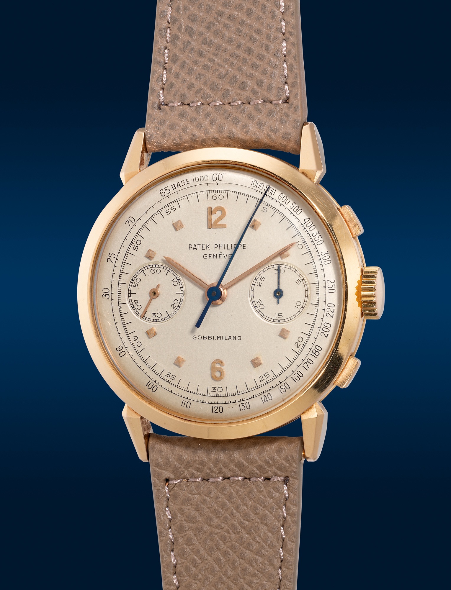 <p><strong>PATEK PHILIPPE</strong> <em>Ref. 1579 in pink gold with Certificate of Origin and presentation box</em>, Circa 1952</p>
