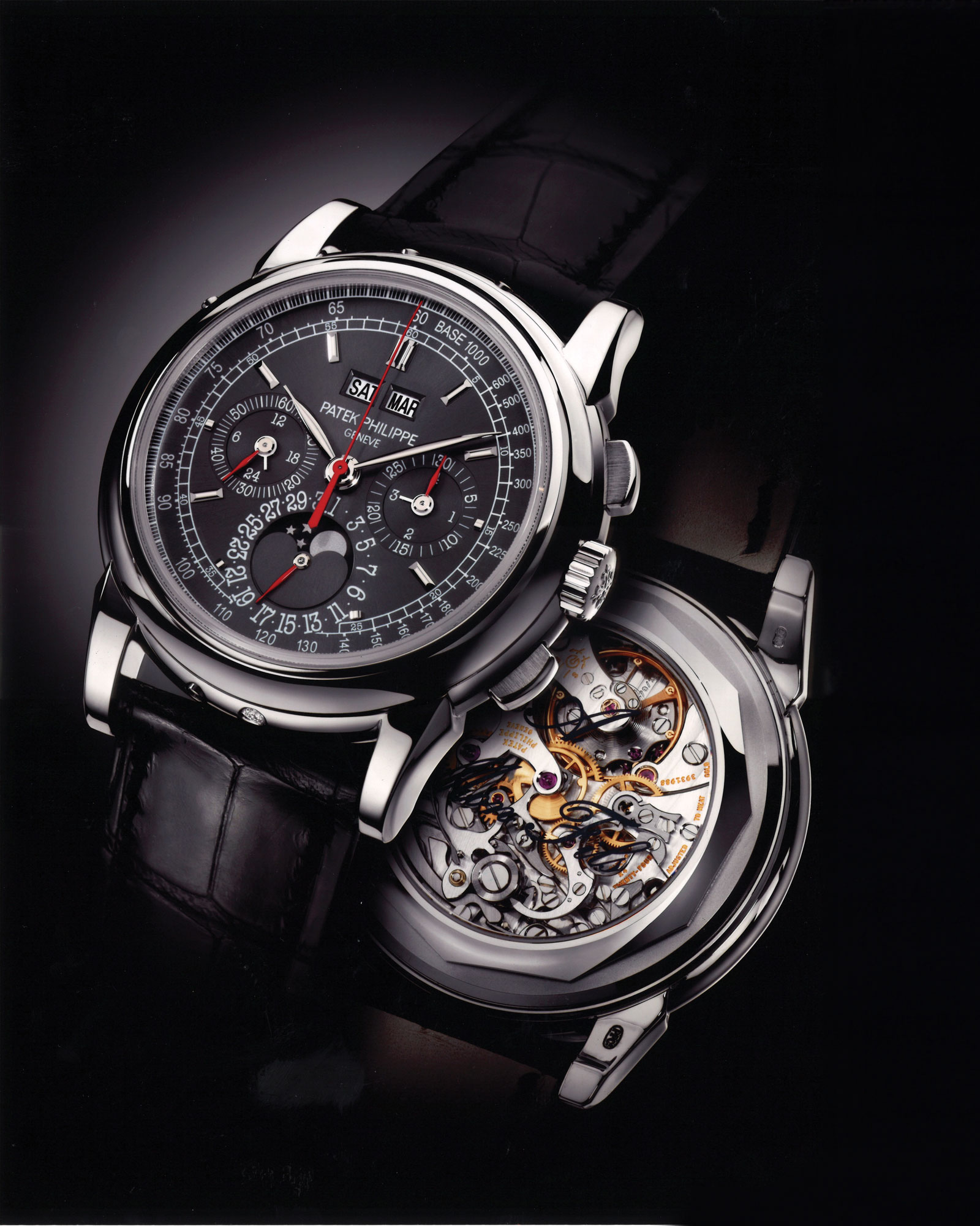 <p><strong>PATEK PHILIPPE</strong> <em>A possibly unique Ref. 5970P-013 in platinum with grey dial, special red hands, double-factory sealed</em>, Circa 2011</p>
