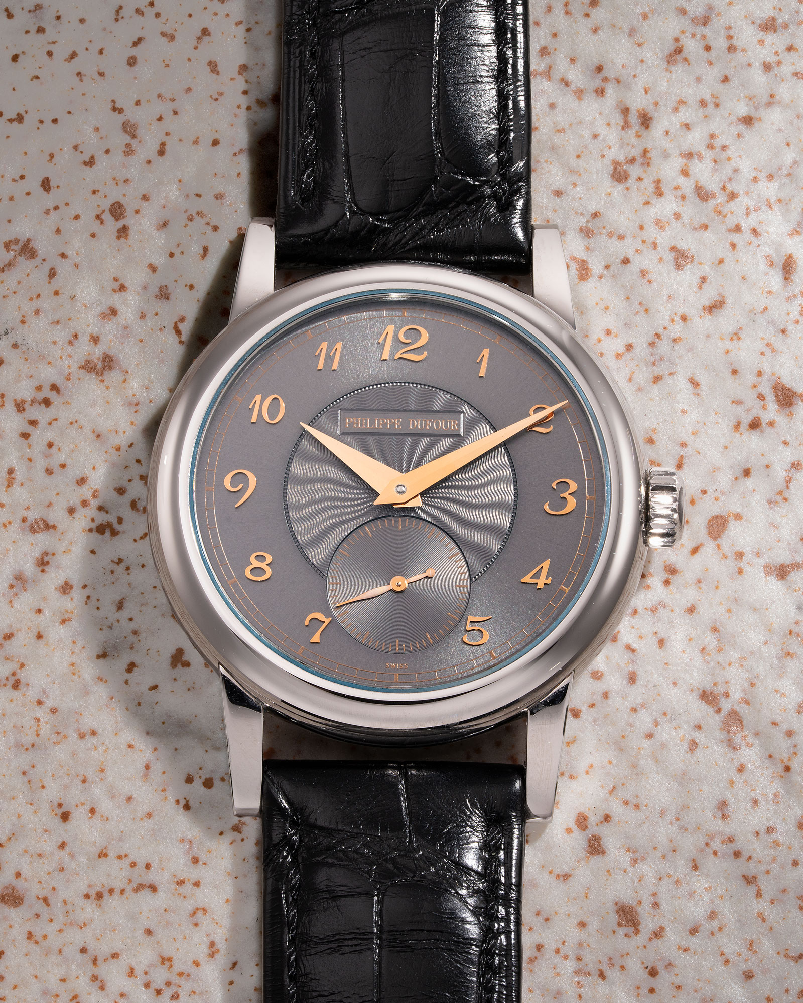 <p><strong>PHILIPPE DUFOUR</strong>&nbsp;<em>Simplicity</em>, An exquisite, extremely rare, first time to appear publicly and only known stainless steel wristwatch with grey guilloch&eacute; dial, Breguet numerals, HK$2,800,000-5,600,000</p>
