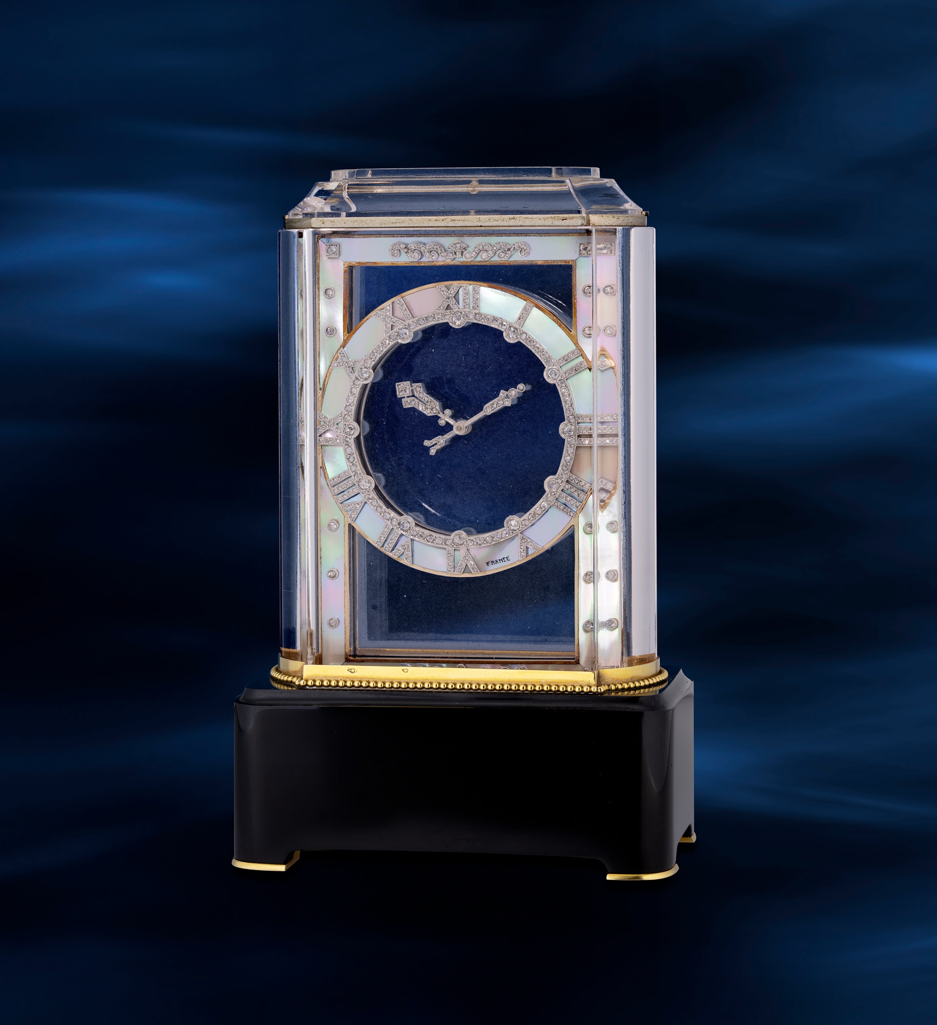 <p><strong>CARTIER</strong> <em>Mod&egrave;le A, an extremely rare Art Deco mystery clock with original key and presentation box</em>, circa 1929</p>
