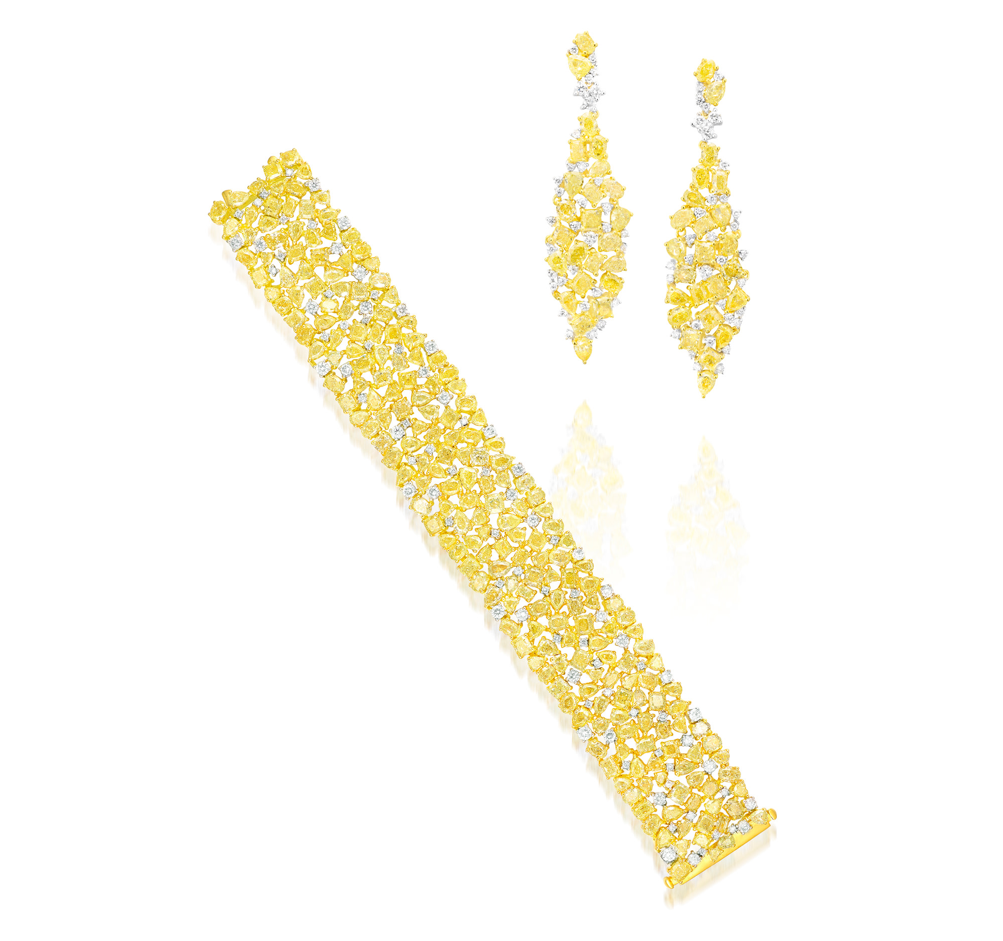 <p>A Coloured Diamond and Diamond Earrings and Bracelet Set</p>
