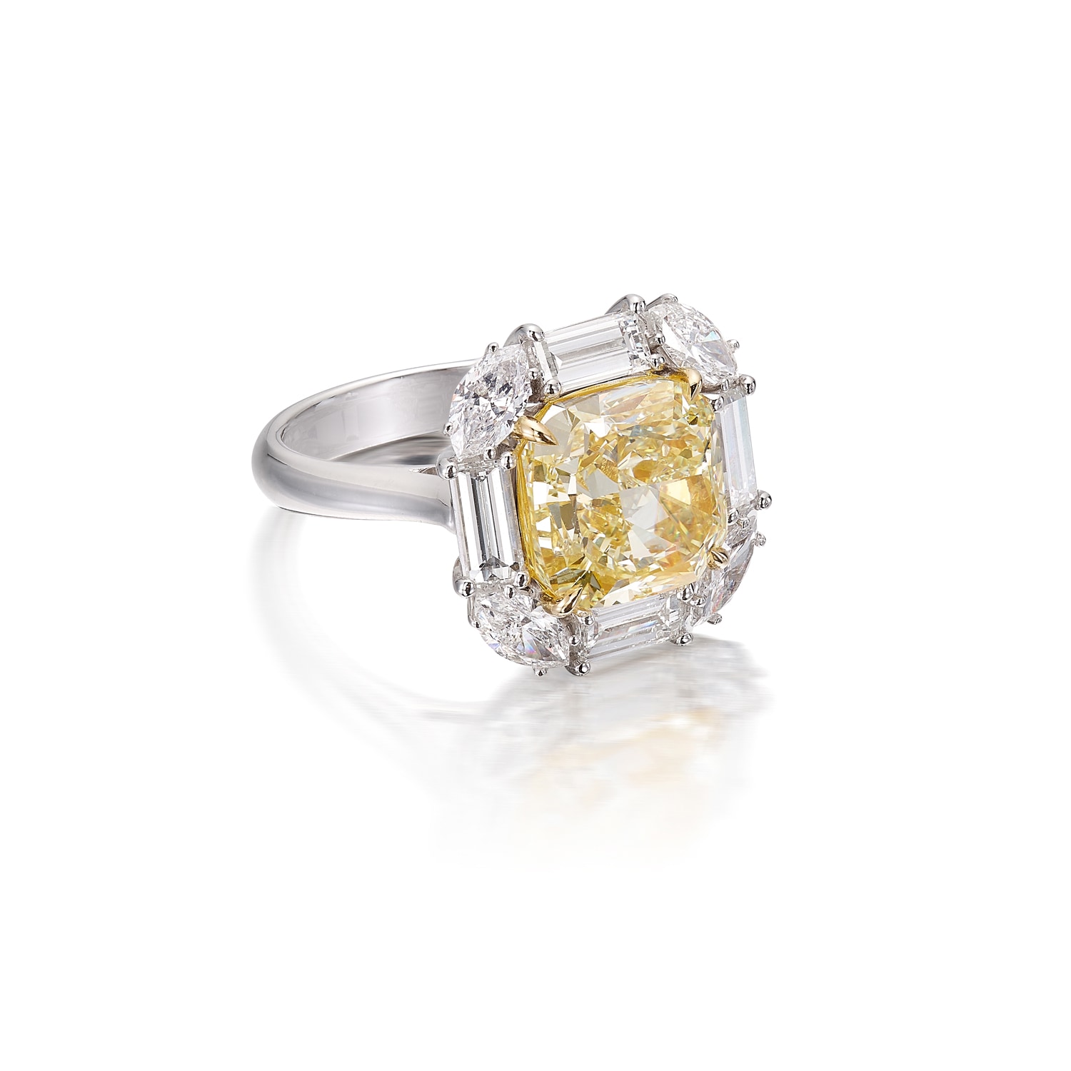 <p>A Fancy Light Yellow Diamond and Diamond Ring </p>