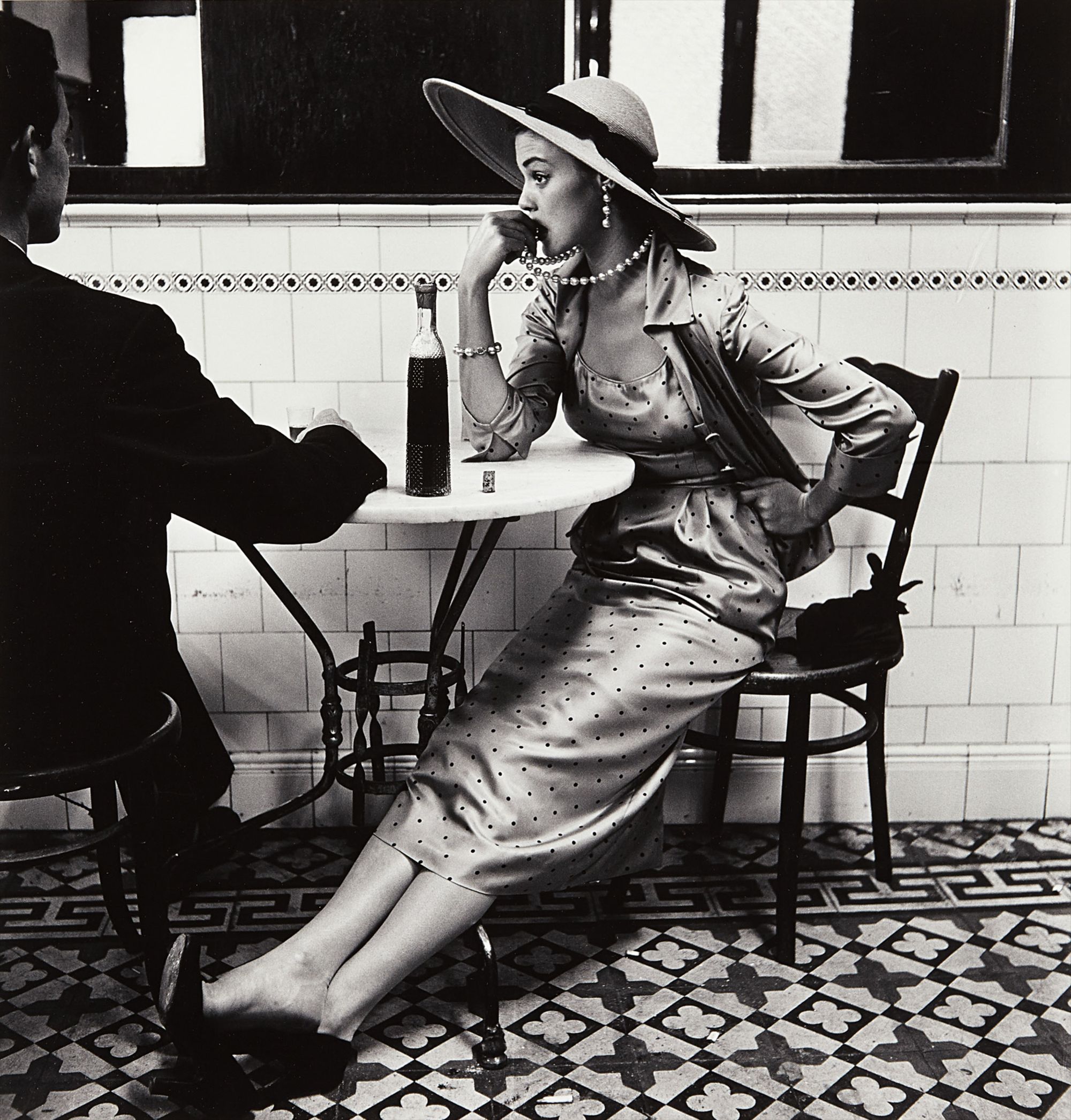 <b>IRVING PENN</b> <i>Vogue Fashion Photograph (Caf&#233; in Lima), Peru (Jean Patchett)</i>, 1948