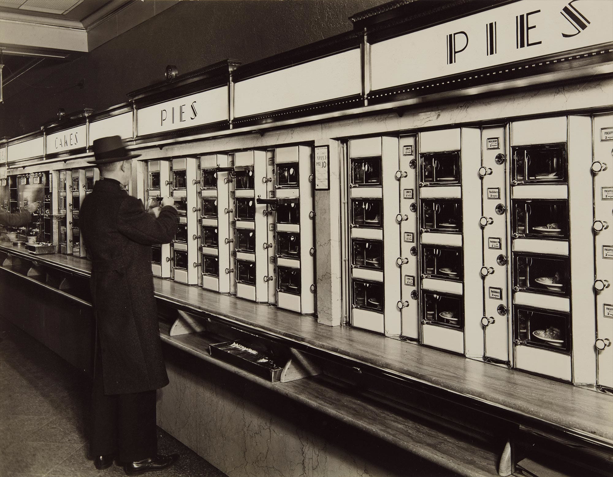 <b>BERENICE ABBOTT </b><i>Automat, 977 Eighth Avenue</i>, 1936. Photographs from the Collection of Jeffrey M. Kaplan, Washington, D.C.